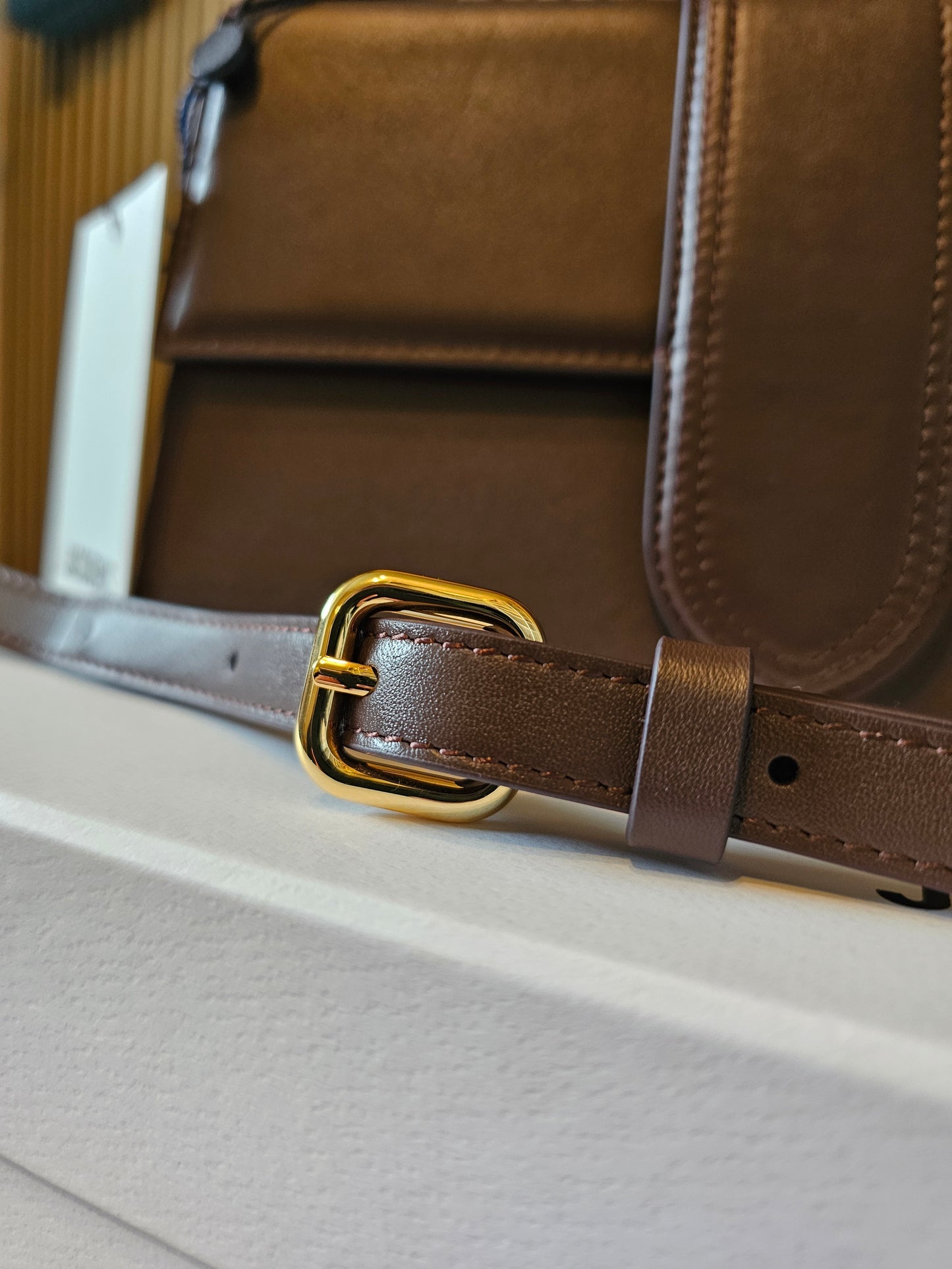 A01850 - Jaquemus bag, large bambino. Brown.