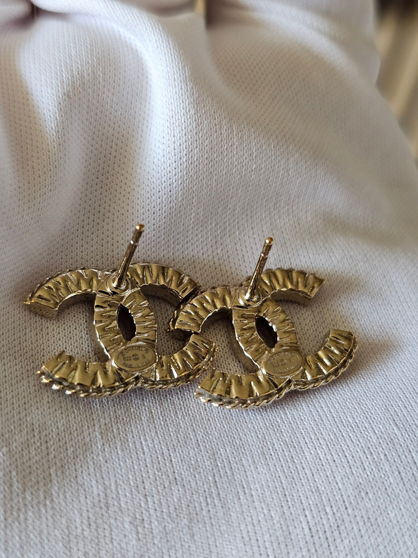 Chanel earrings, golden cc with stones.