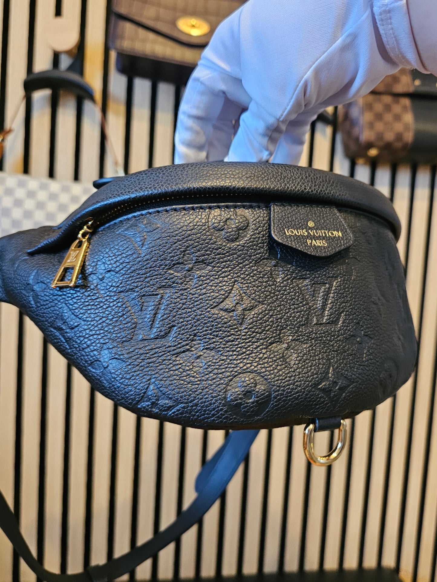 M44812- Louis Vuitton Bumbag in Monogram, black empreinte leather.