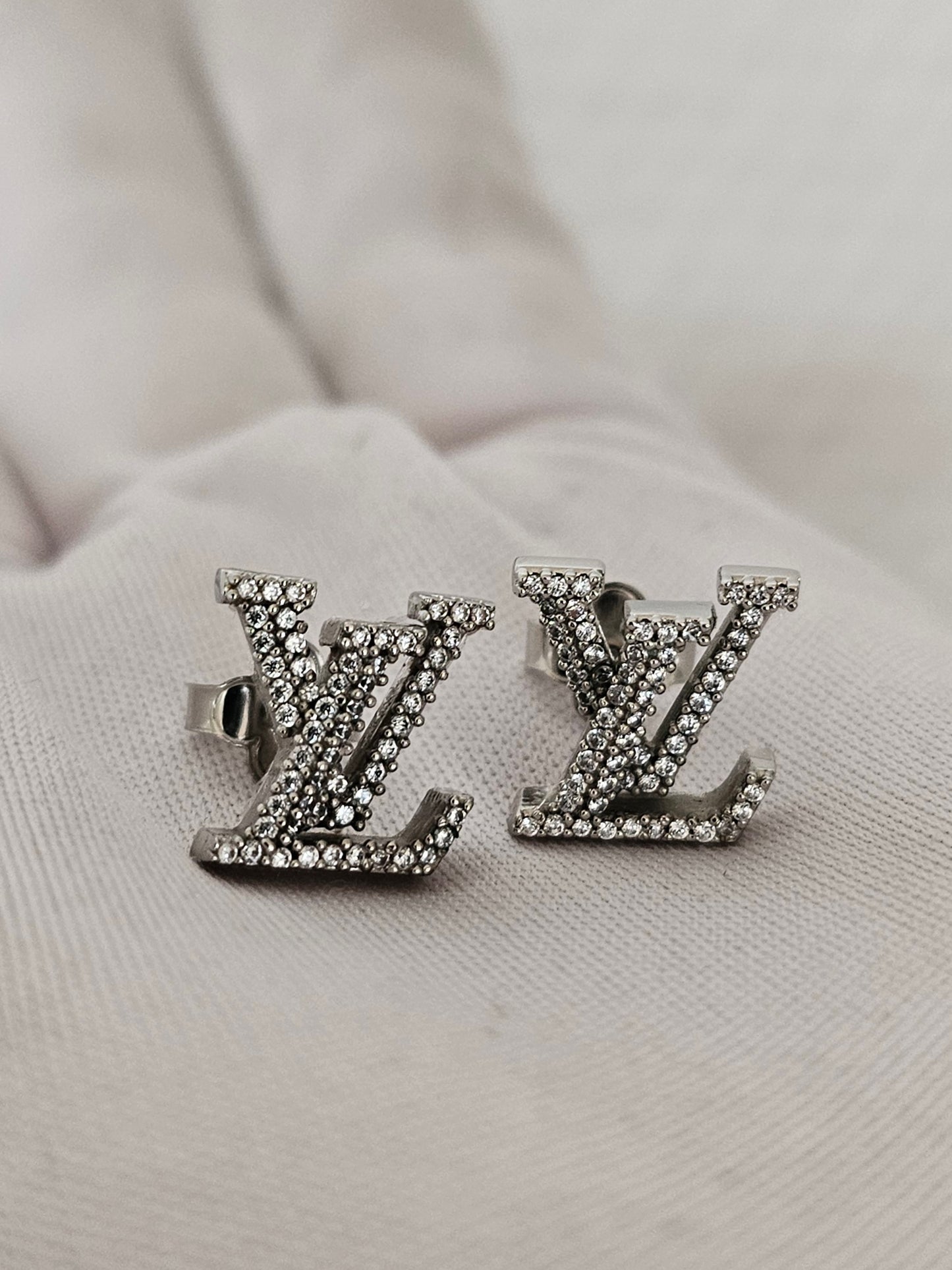 Louis Vuitton iconic LV earrings, silver/palladium with stones.