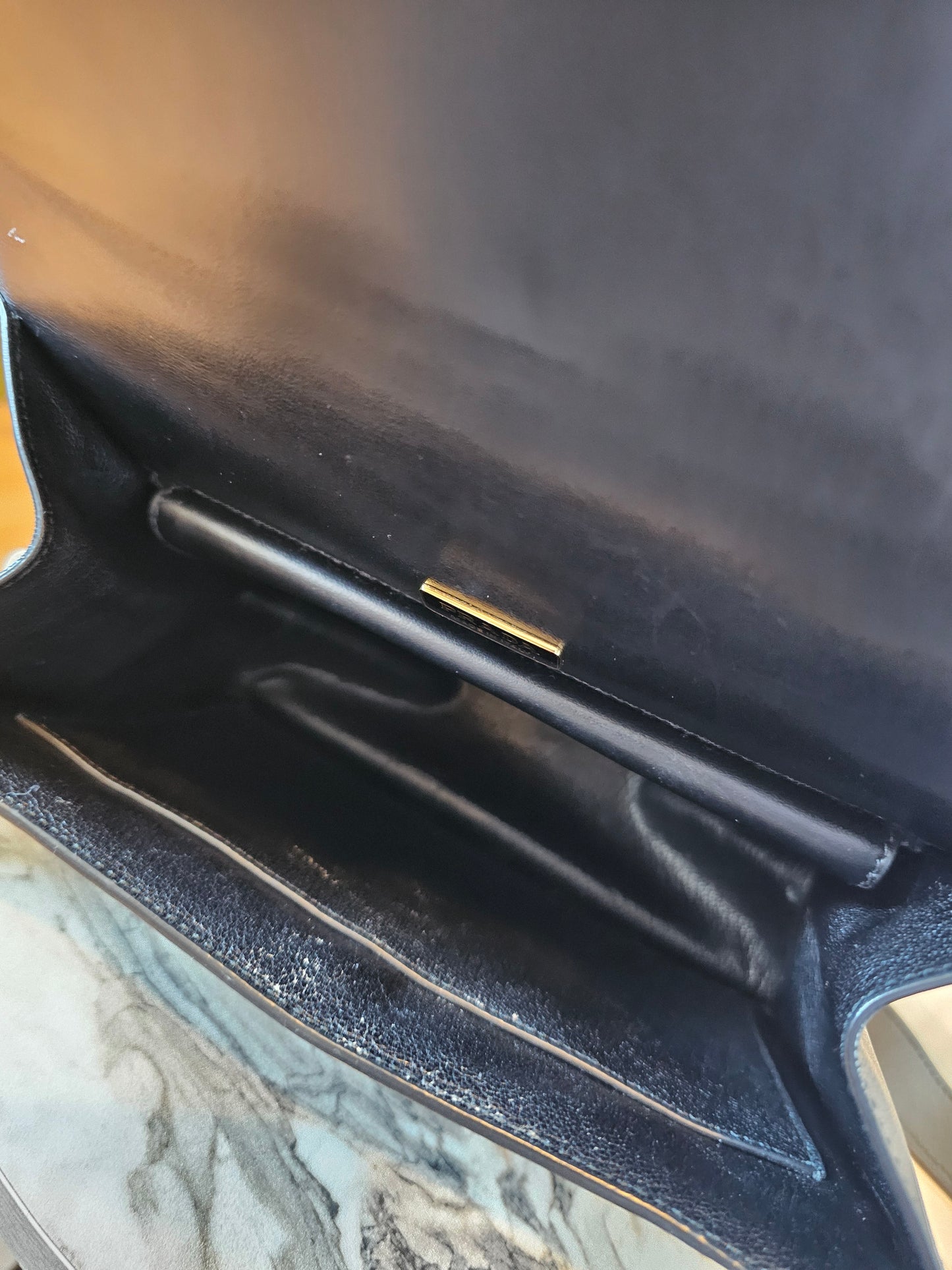 Prada Cahier bag animalier, black saffiano leather.