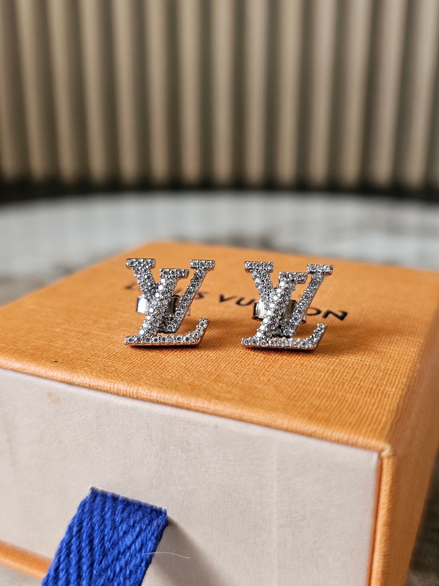 Louis Vuitton iconic LV earrings, silver/palladium with stones.
