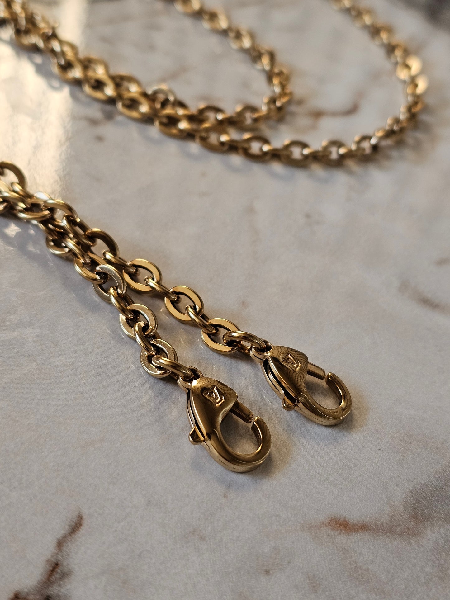 Louis Vuitton guldkæde fra Félicie pochette taske.