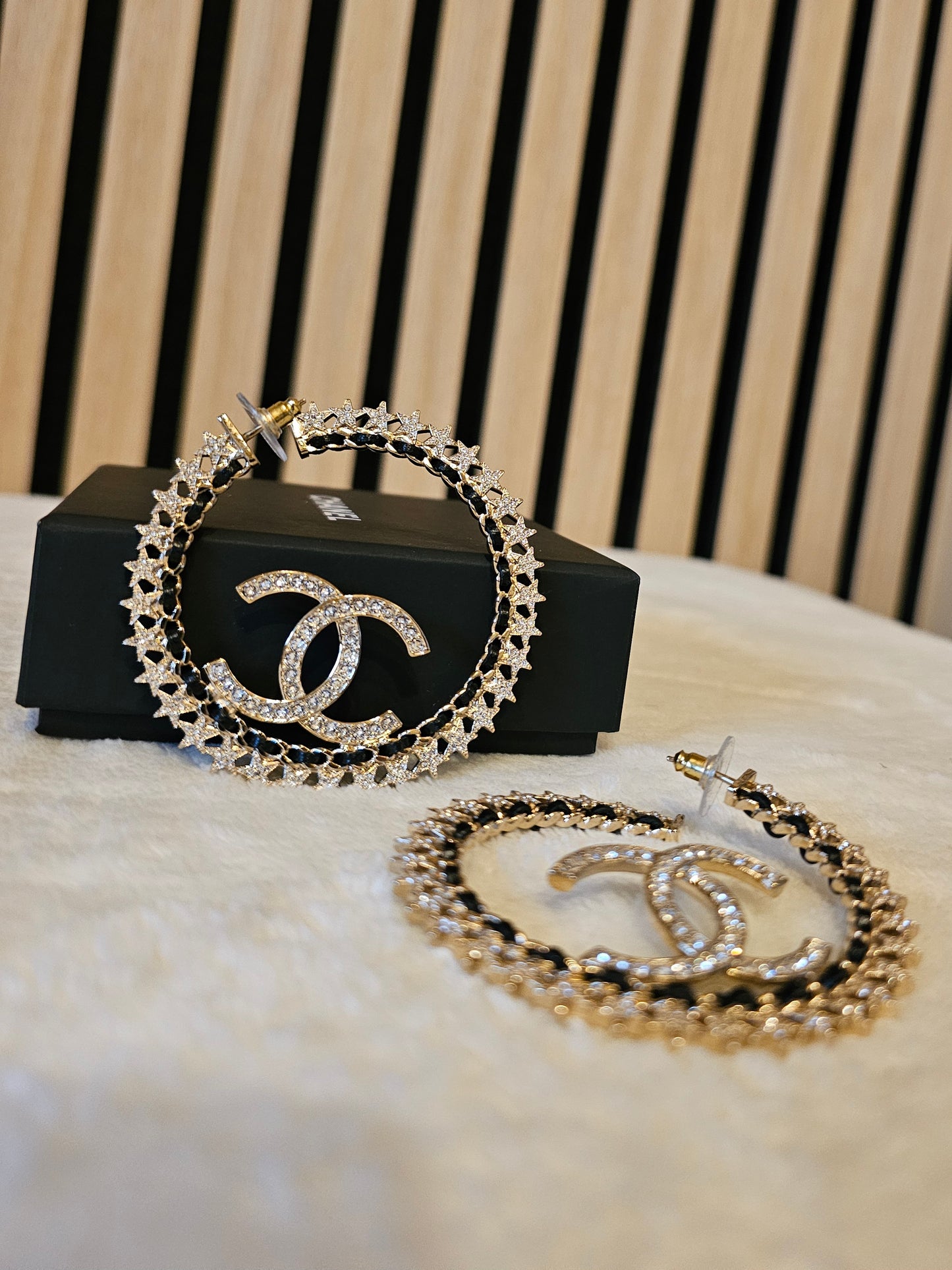 Chanel Golden hoops with crystals.