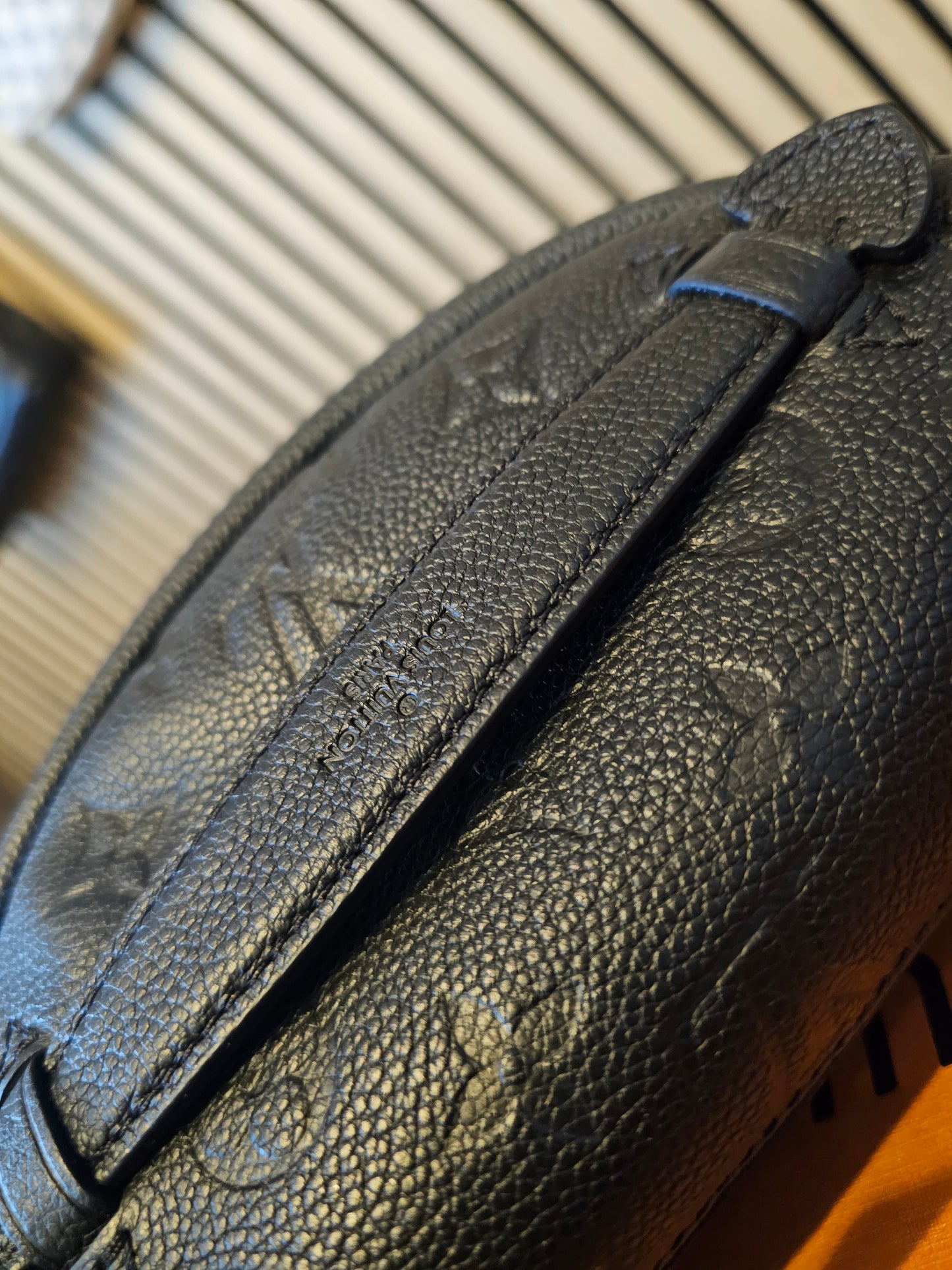 M44812- Louis Vuitton Bumbag in Monogram, black empreinte leather.