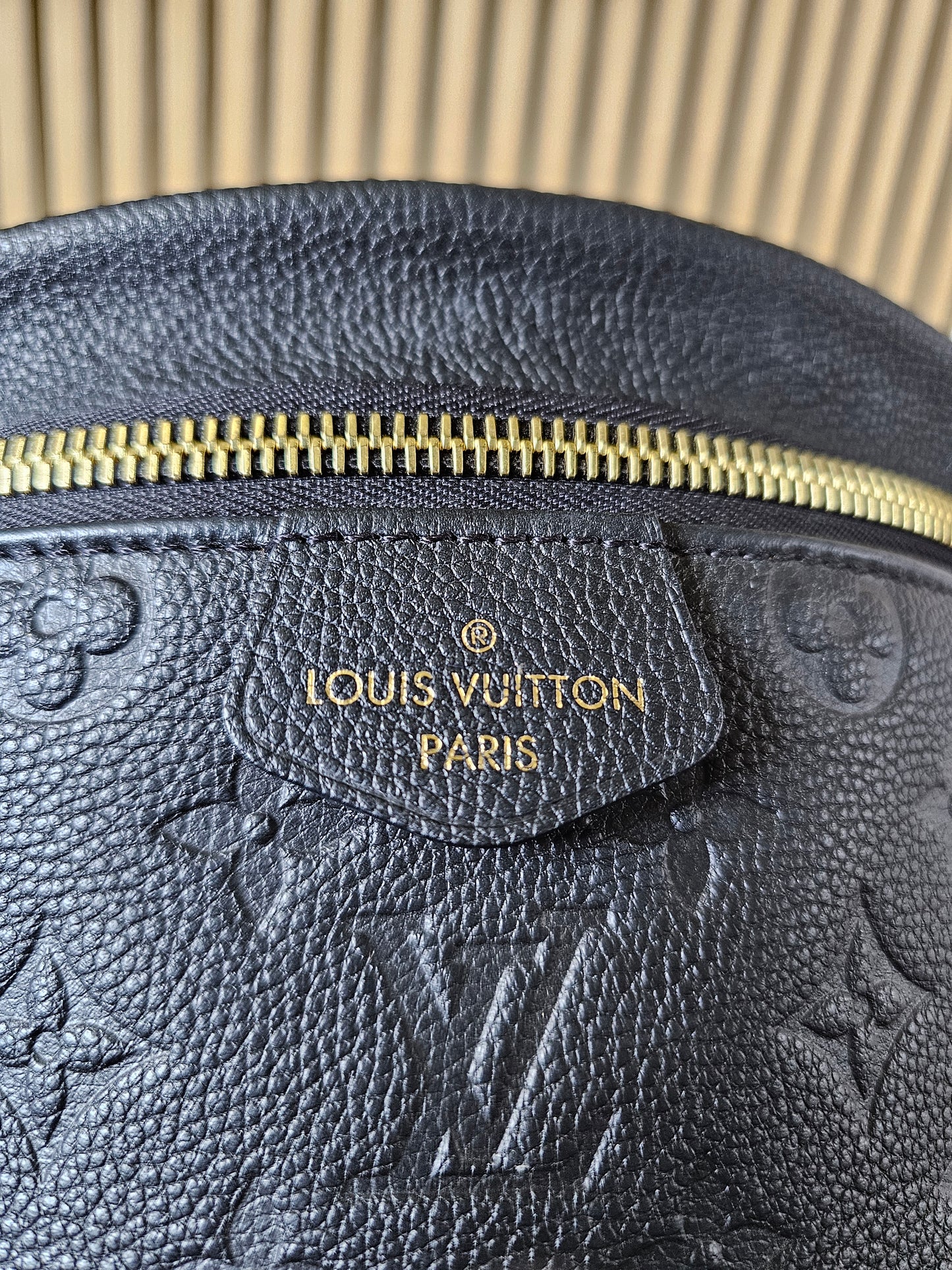 M44812 Louis Vuitton bumbag, Black, MNG. Empreinte lether.