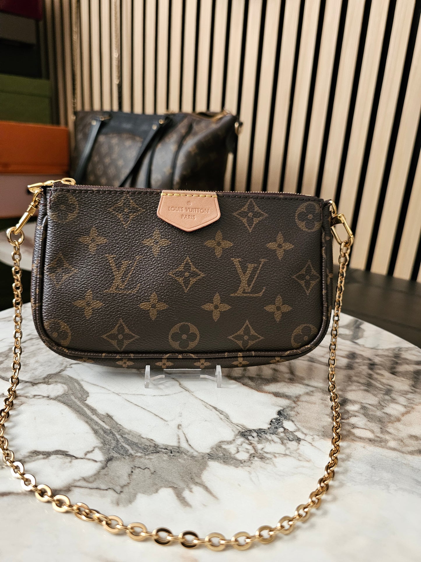 Louis Vuitton pochette with chain, monogram kanvas.