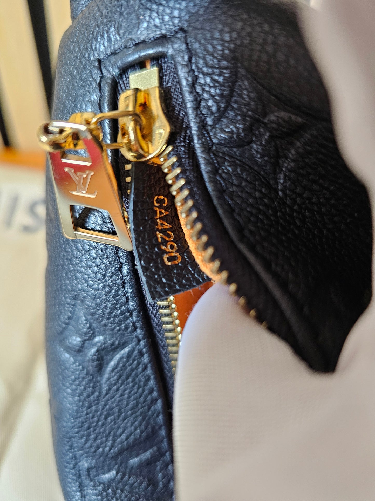 M44812 - Louis Vuitton Bumbag, MNG. Black Empreinte leather.