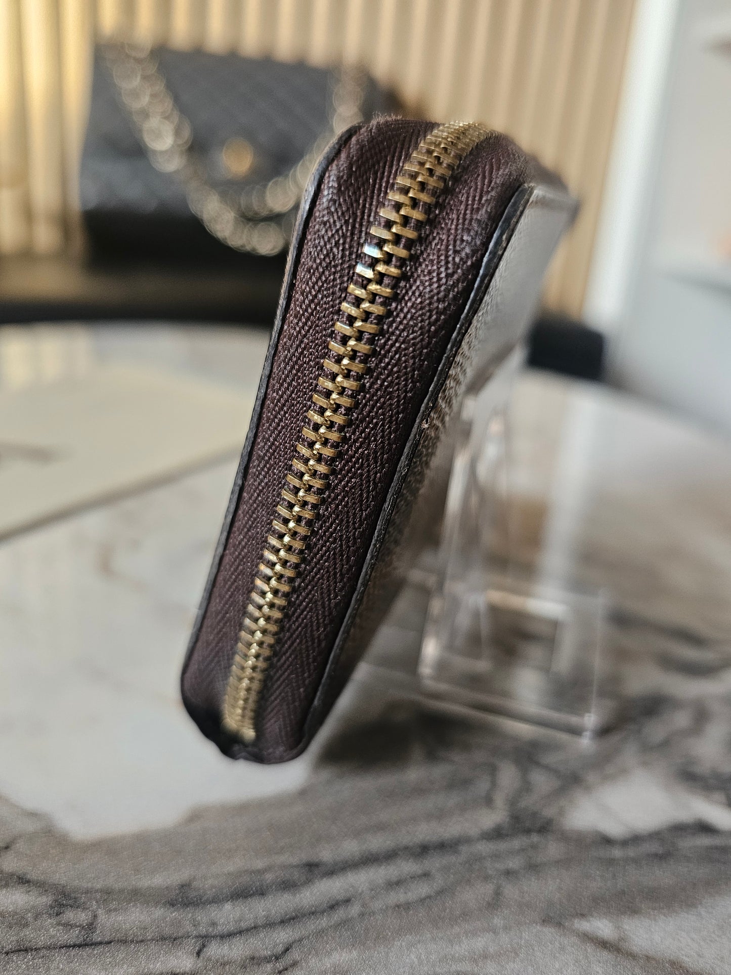 N63070- Louis Vuitton Zippy coin purse i damier ebene.