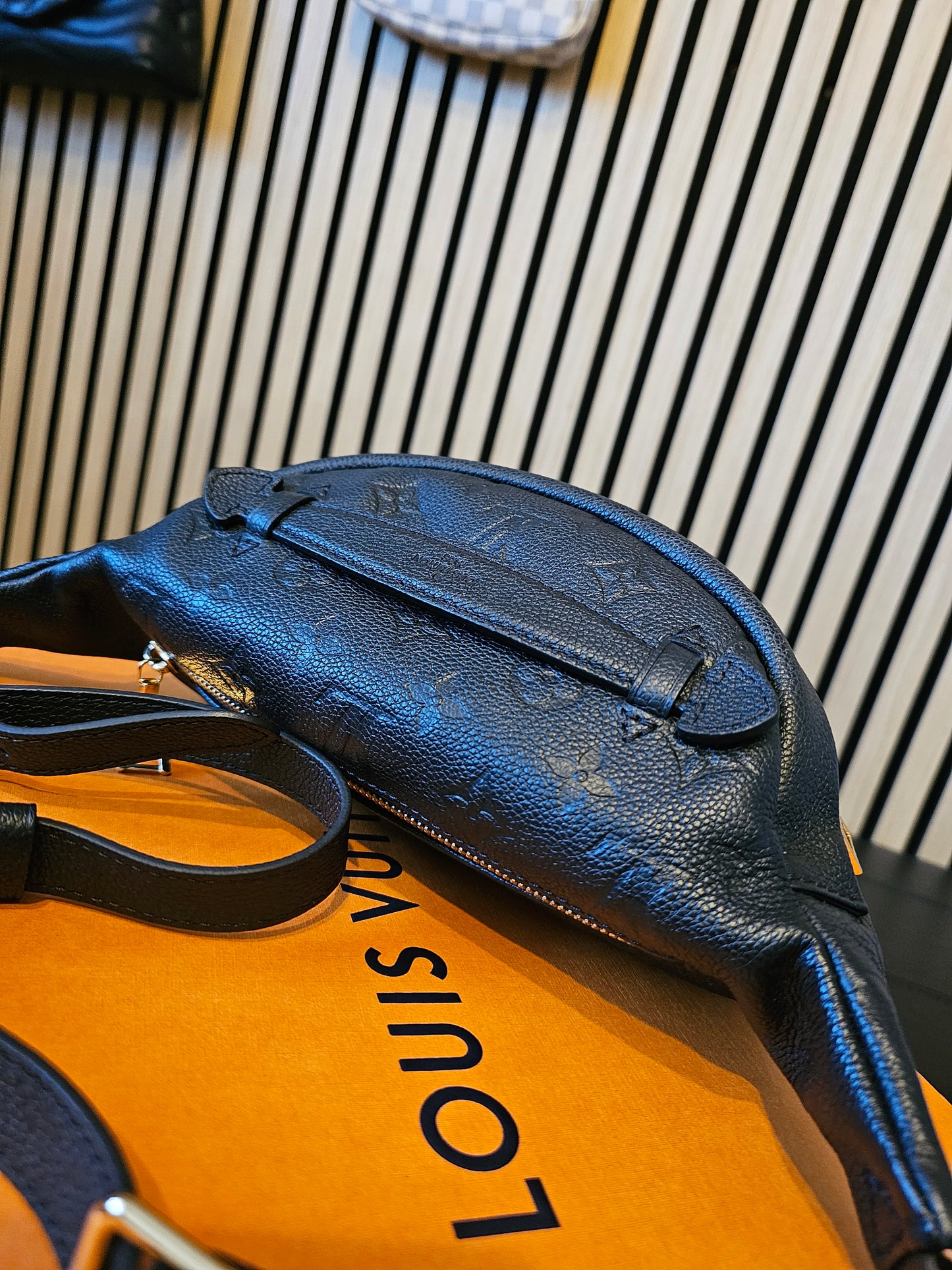 M44812- Louis Vuitton Bumbag in Monogram, black empreinte leather.