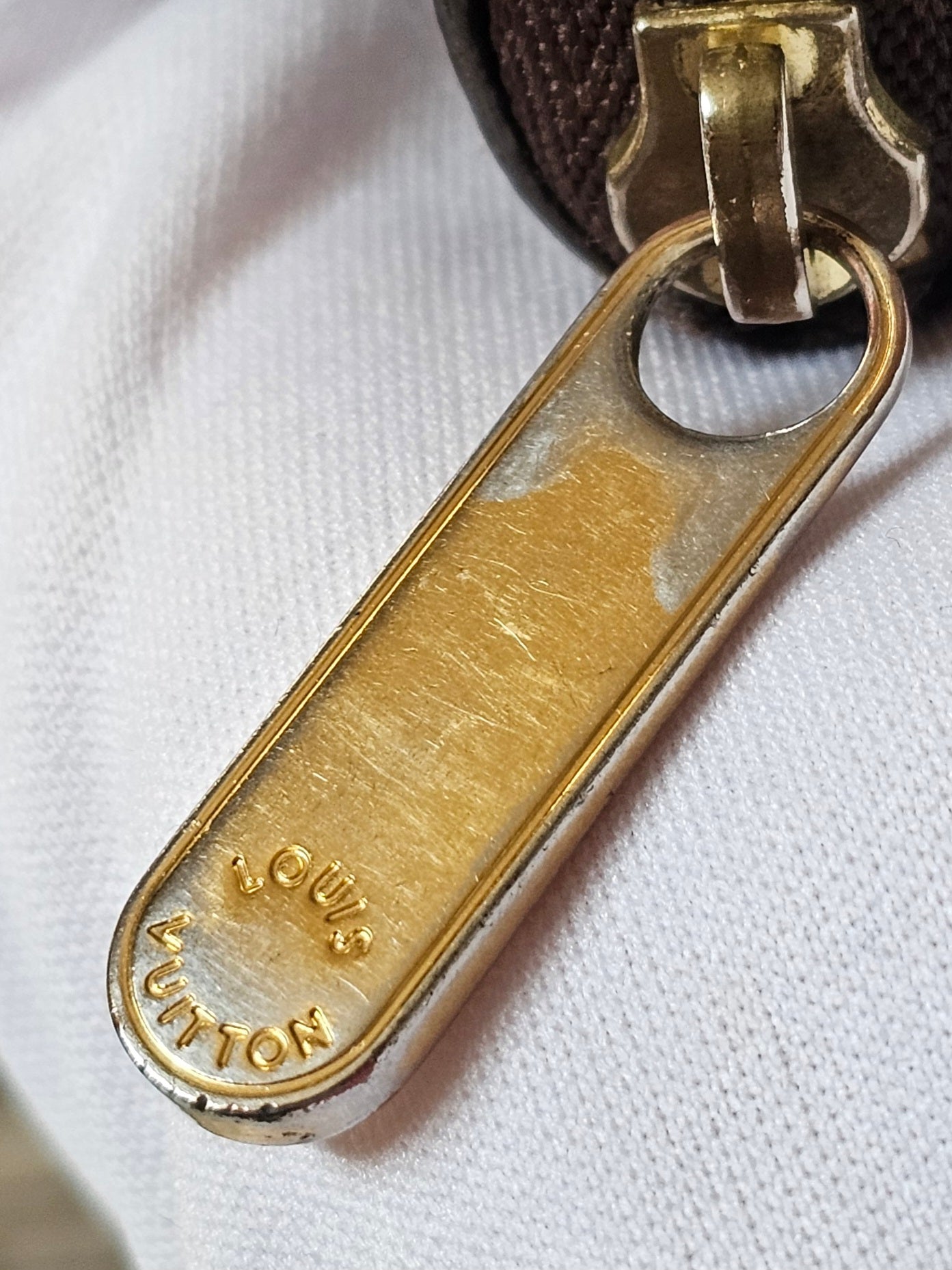 N63070- Louis Vuitton Zippy coin purse i damier ebene.