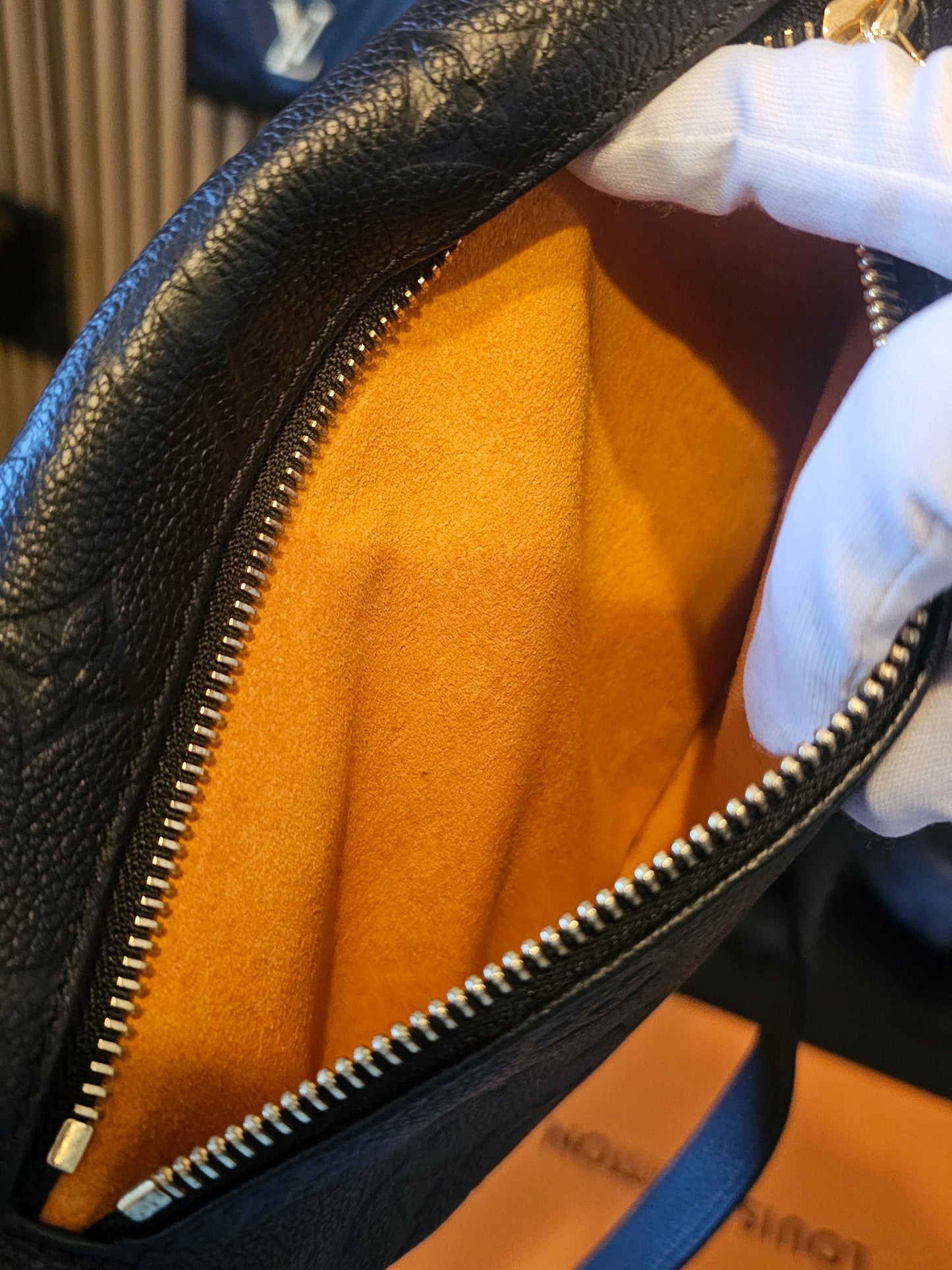 M44812- Louis Vuitton Bumbag in Monogram, black empreinte leather.