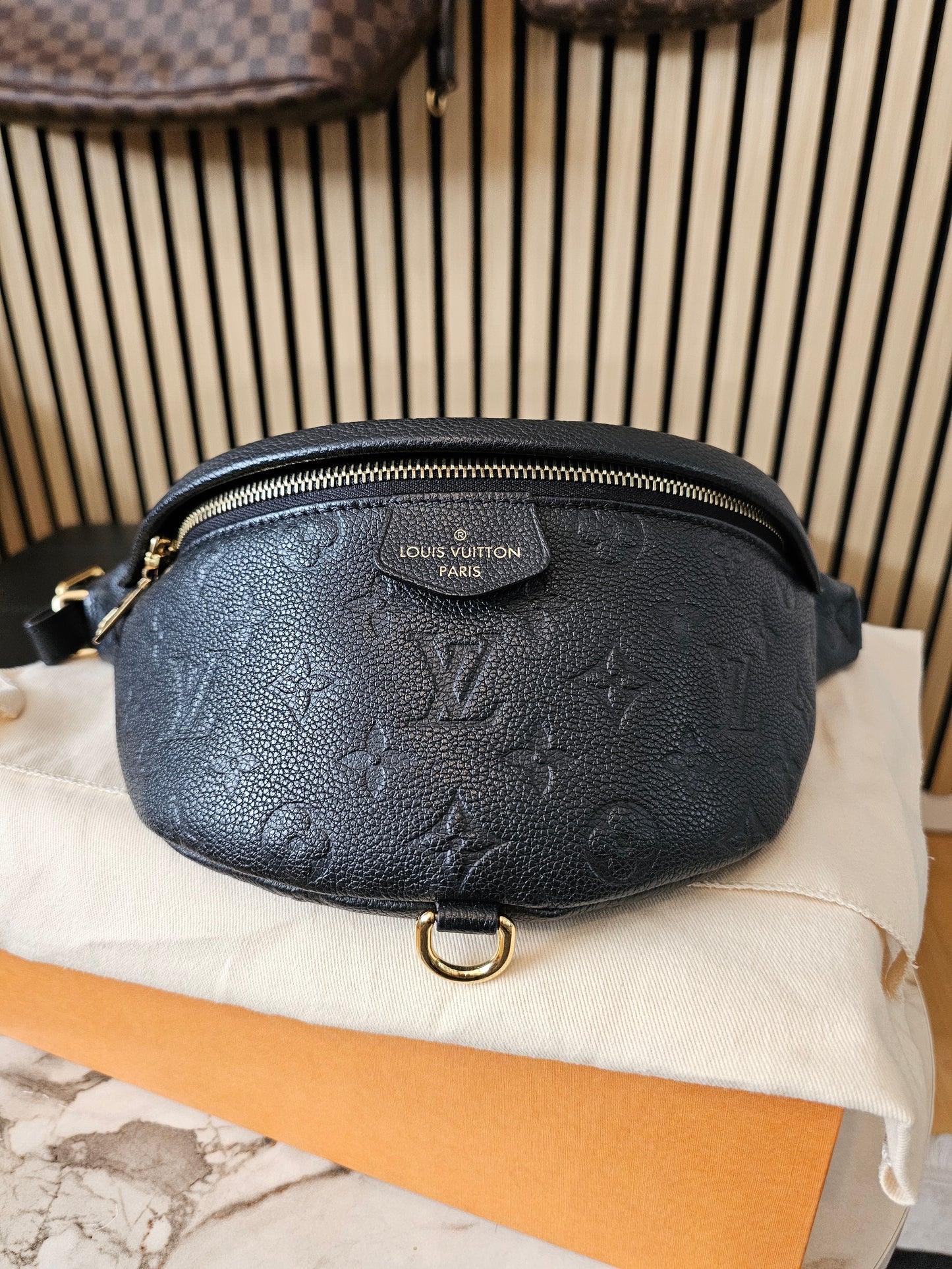 M44812 - Louis Vuitton Bumbag, MNG. Black empreinte leather.