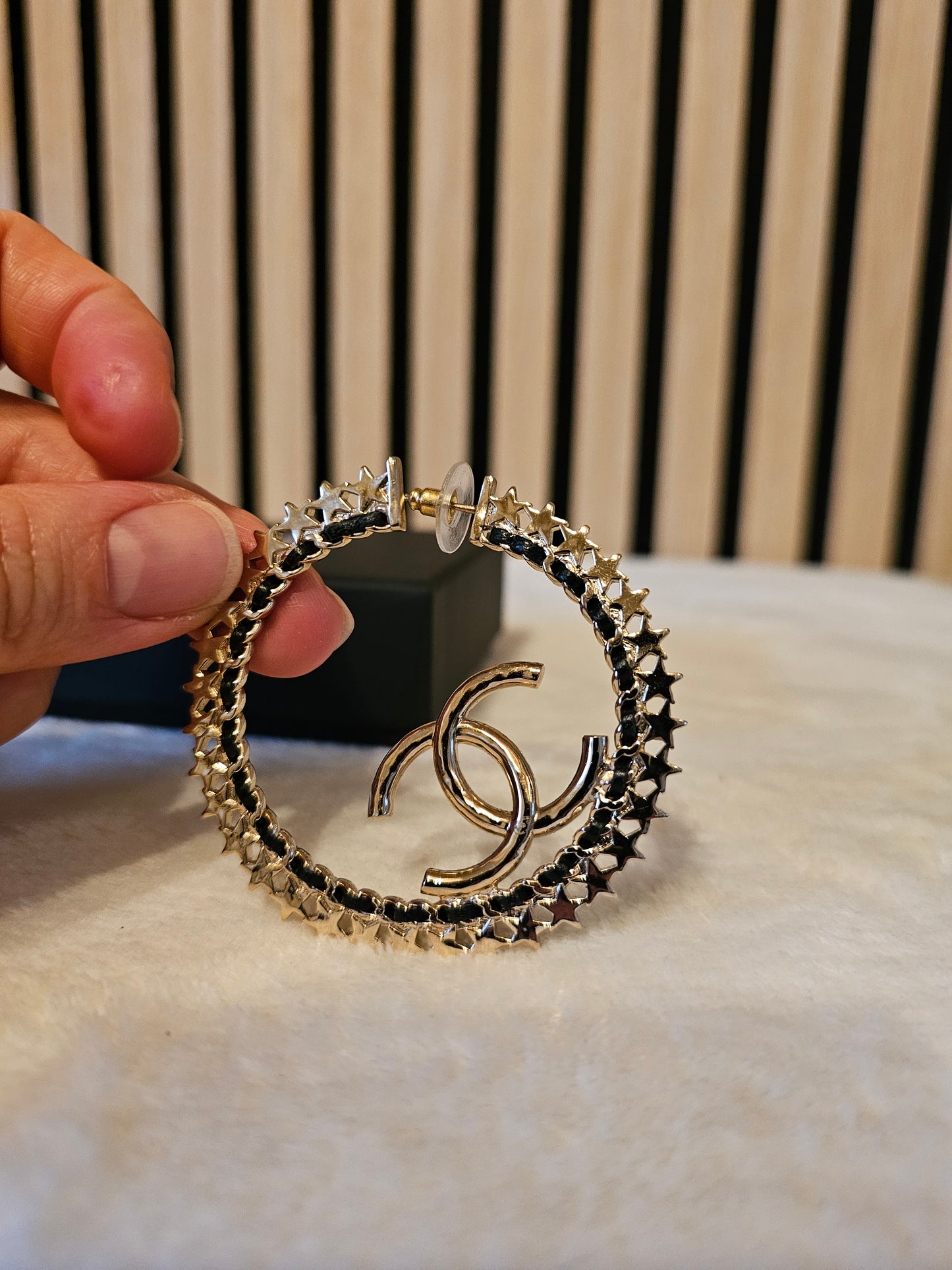 Chanel Golden hoops with crystals.