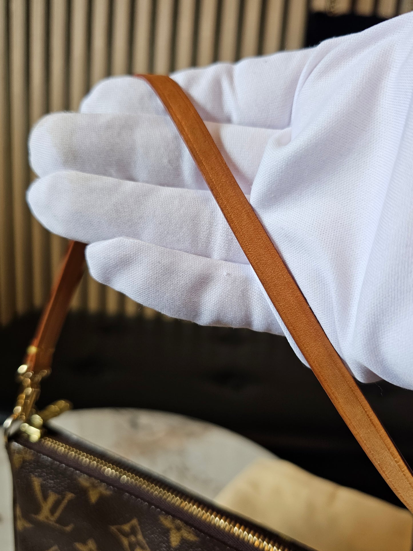 Louis Vuitton pochette accesories in monogram kanvas.