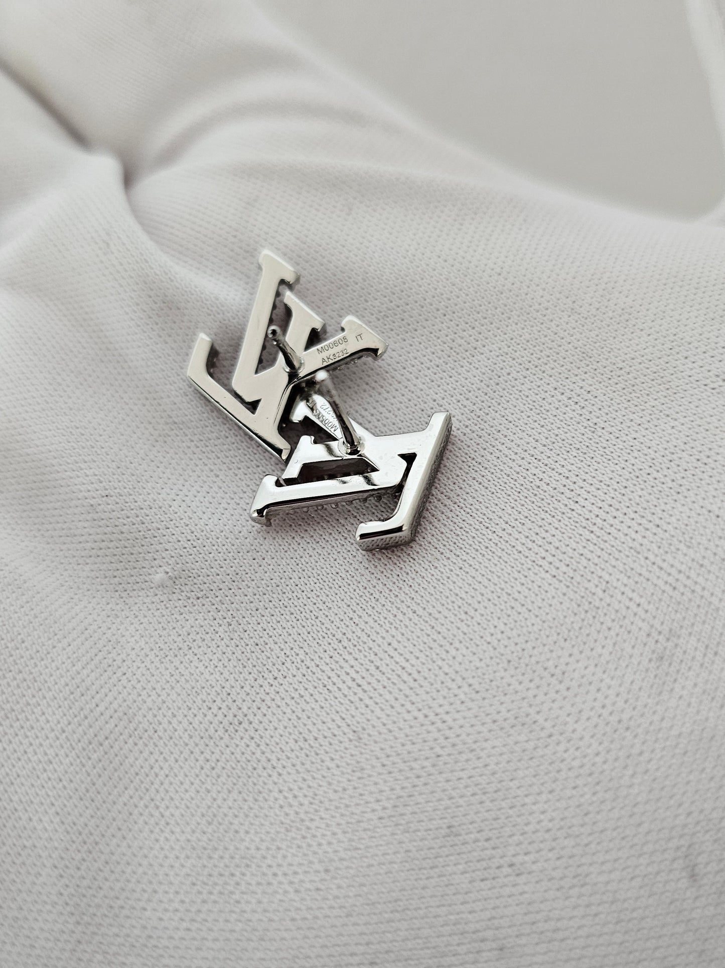 Louis Vuitton iconic LV earrings, silver/palladium with stones.