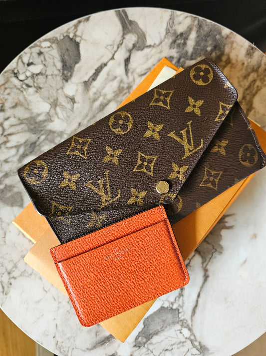 M62203 - Louis Vuitton, Jeanne wallet in MNG. Kanvas.