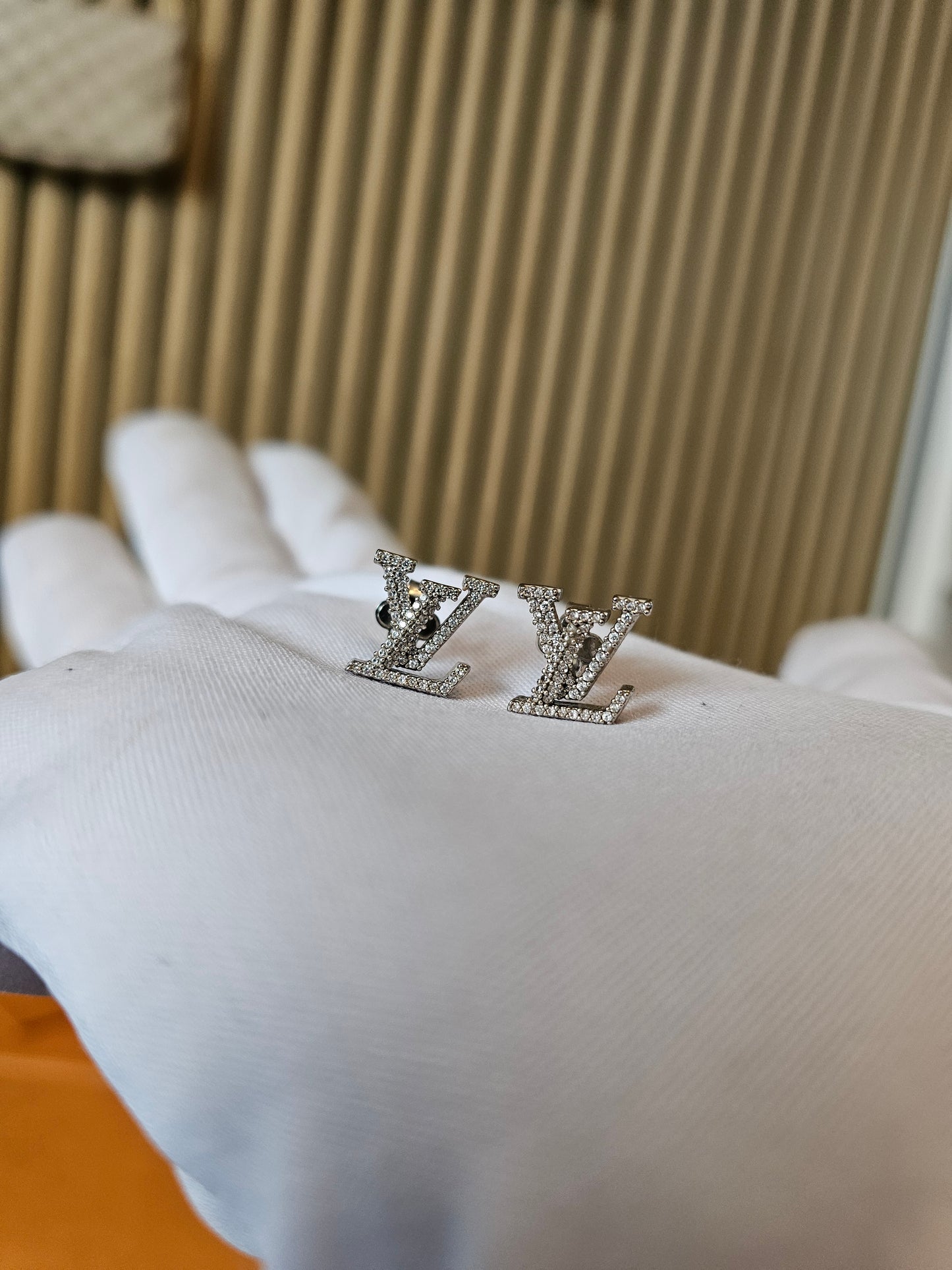 M00608 Louis Vuitton iconic LV earrings.