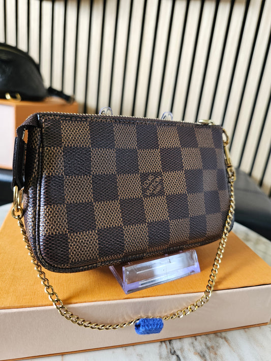 Louis Vuitton - mini pochette Acc. Damier ebene.