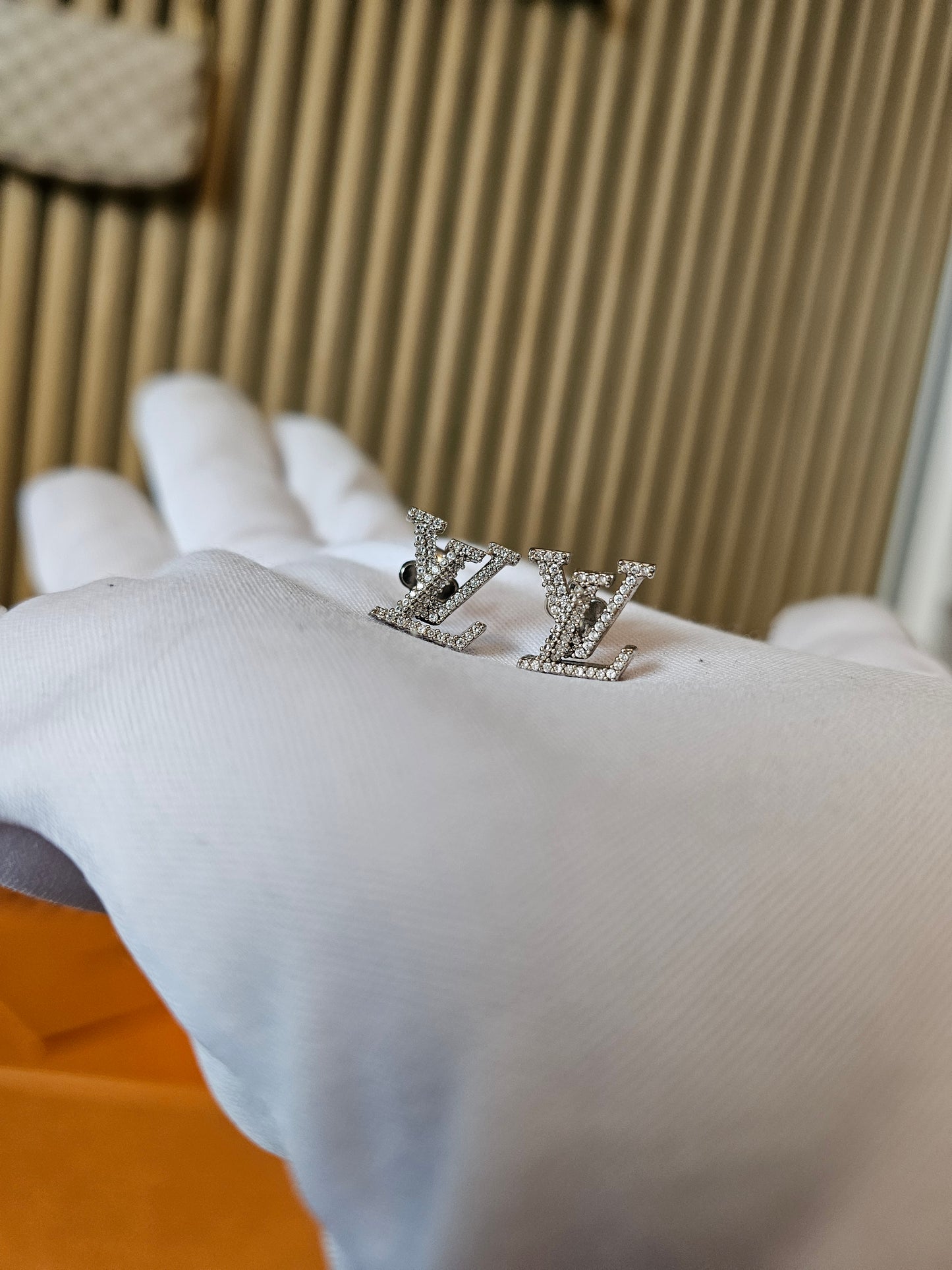 M00608 Louis Vuitton iconic LV earrings.