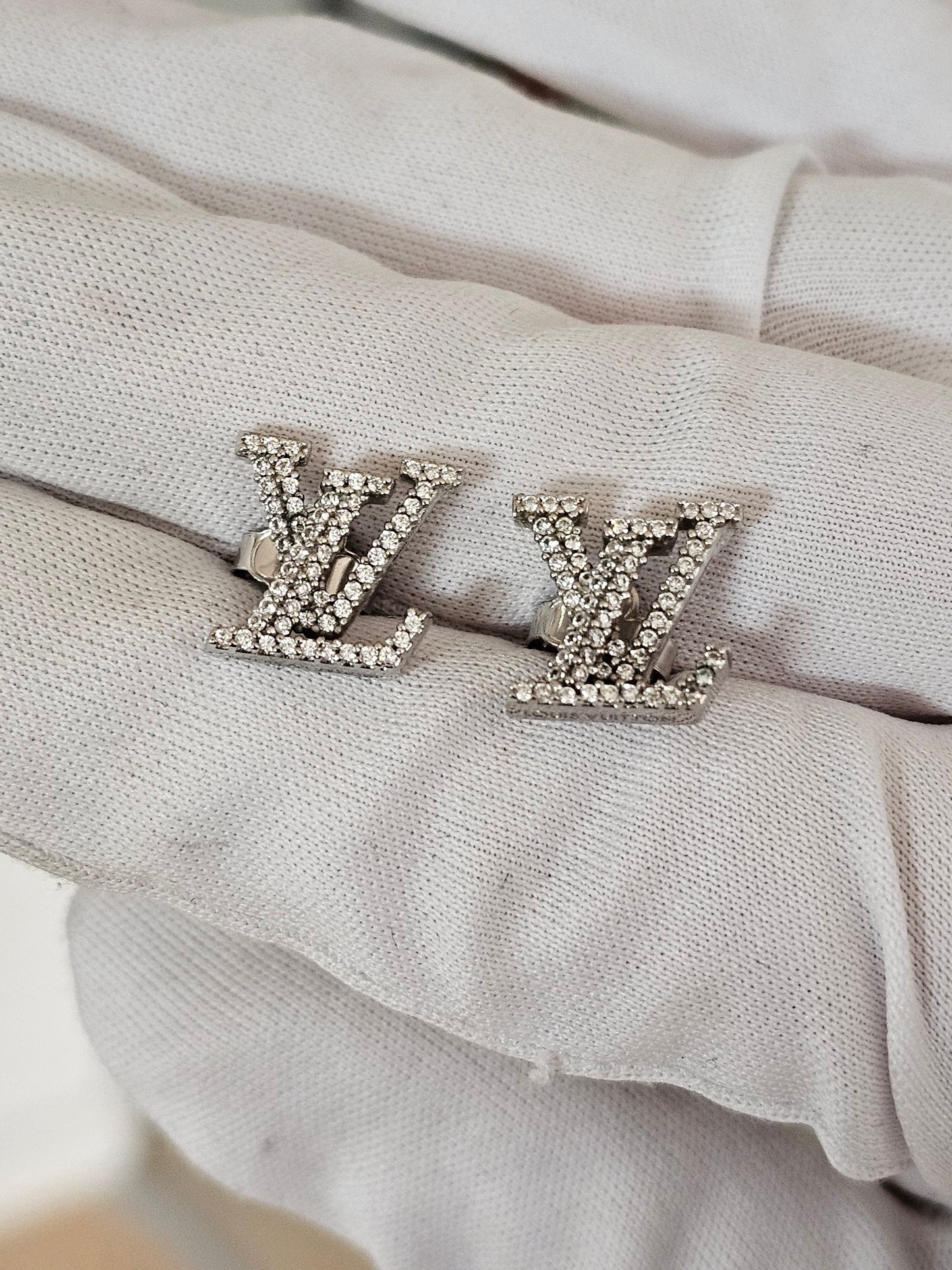 Louis Vuitton iconic LV earrings, silver/palladium with stones.