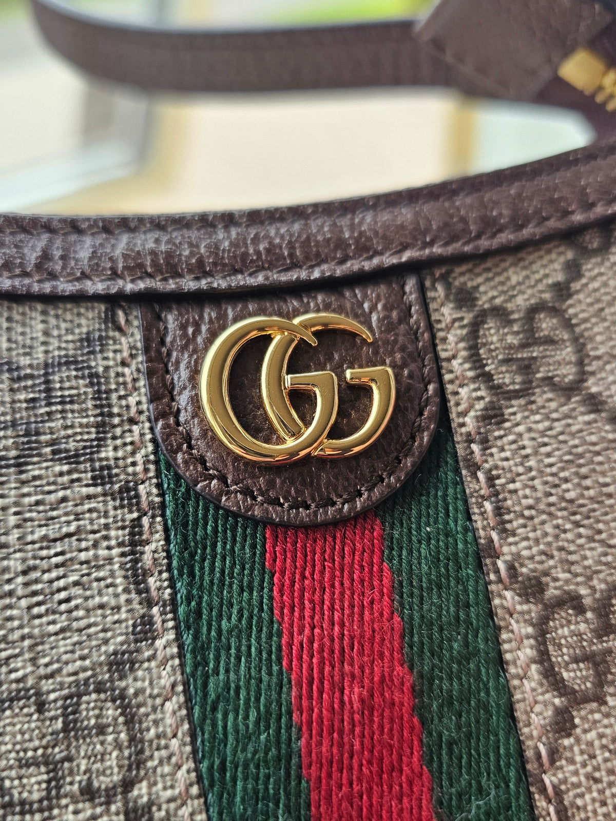 746055- Gucci GG mini ophidia clutch.