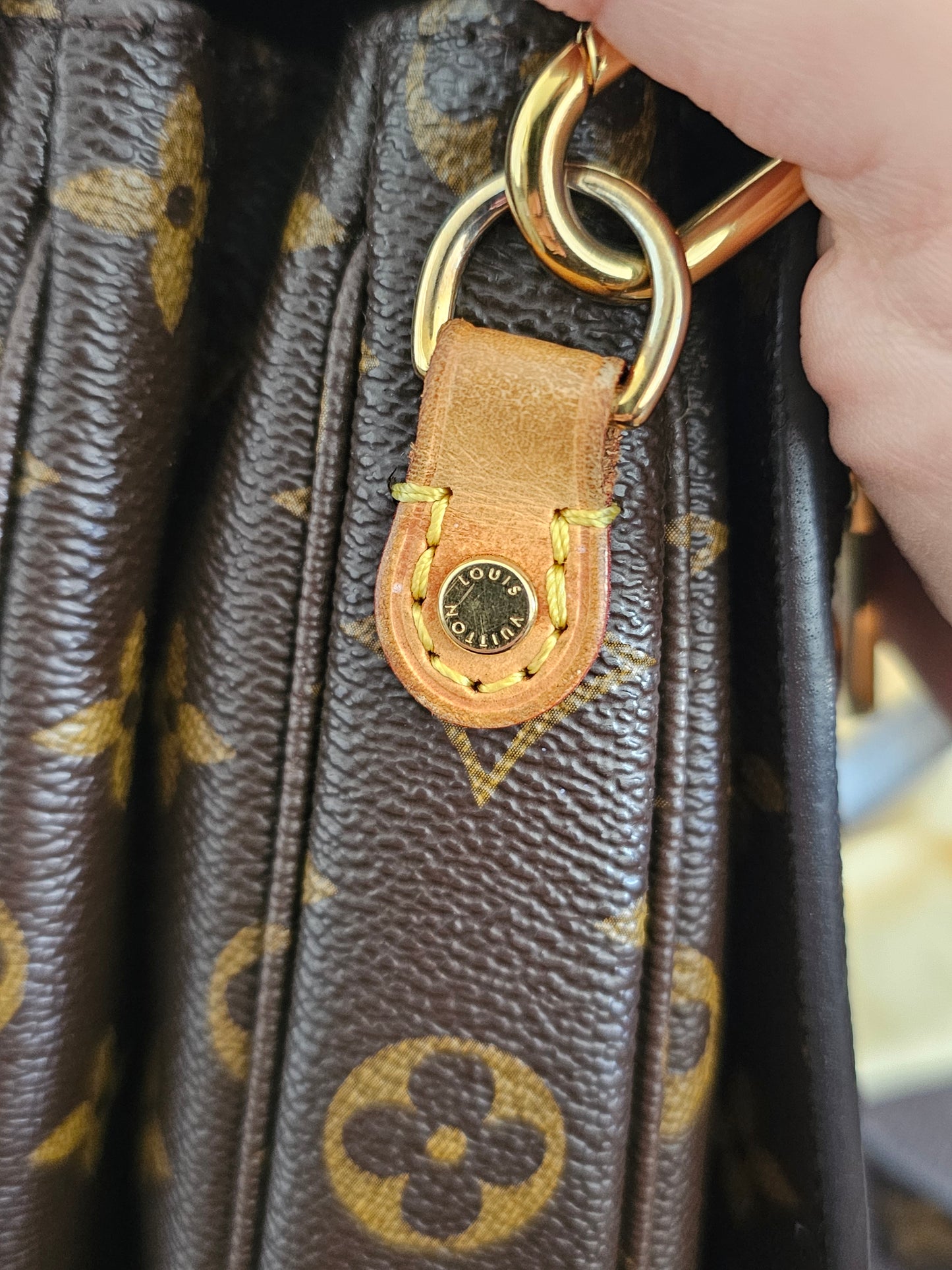 Louis Vuitton Pochette Métis monogram kanvas.