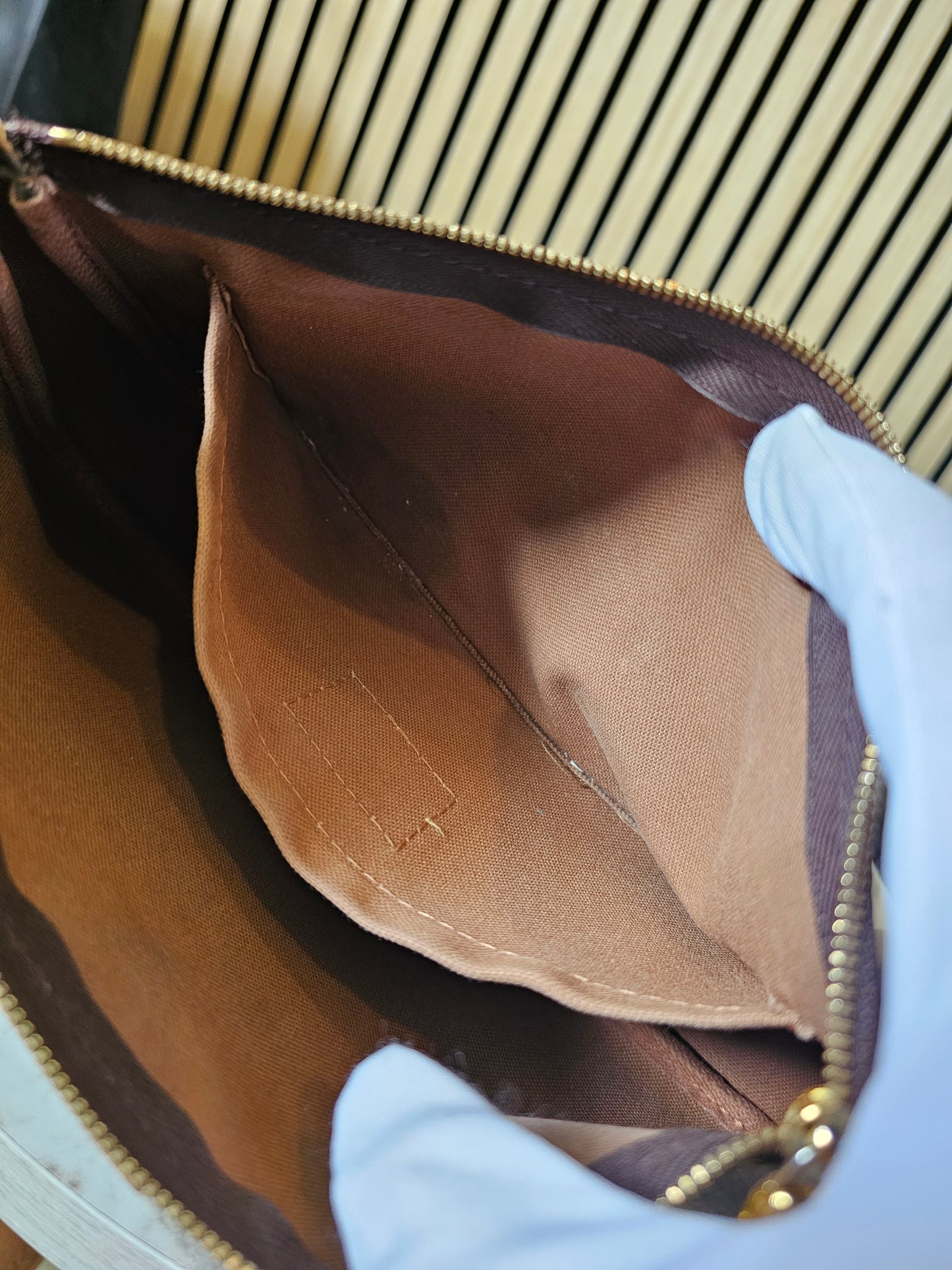 Louis Vuitton pochette accesories in monogram kanvas.