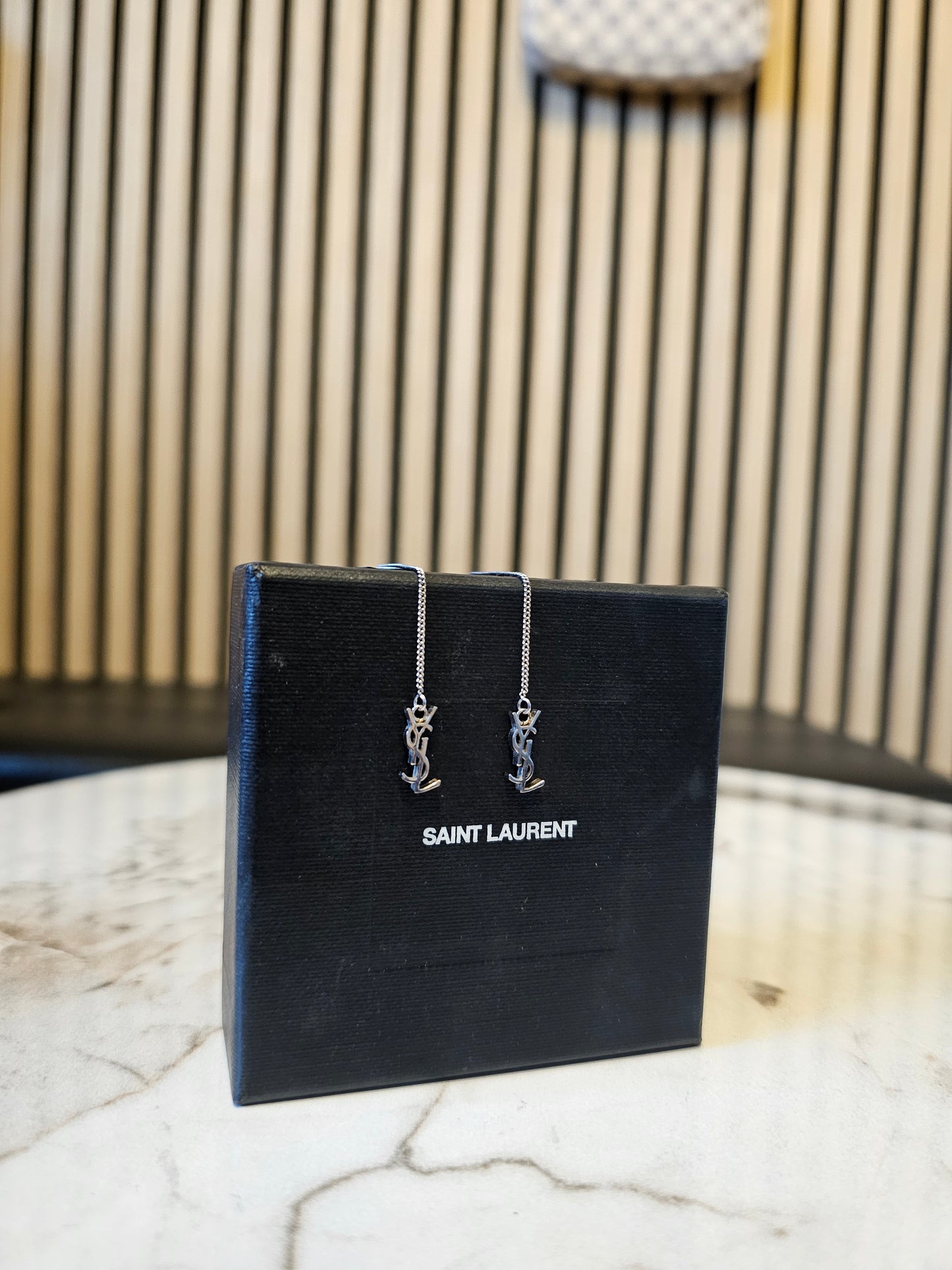 YSL Cassandre long earrings in silver.