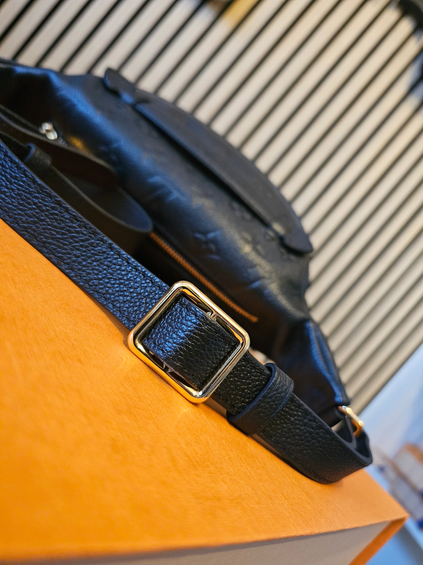 M44812- Louis Vuitton Bumbag in Monogram, black empreinte leather.