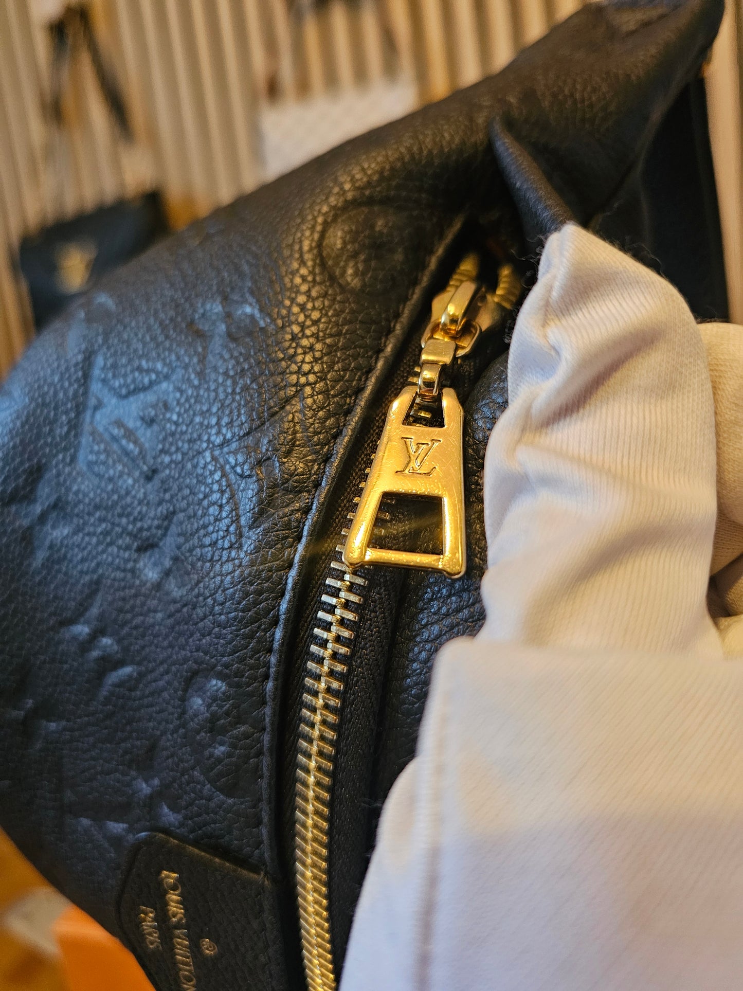 M44812- Louis Vuitton Bumbag in Monogram, black empreinte leather.