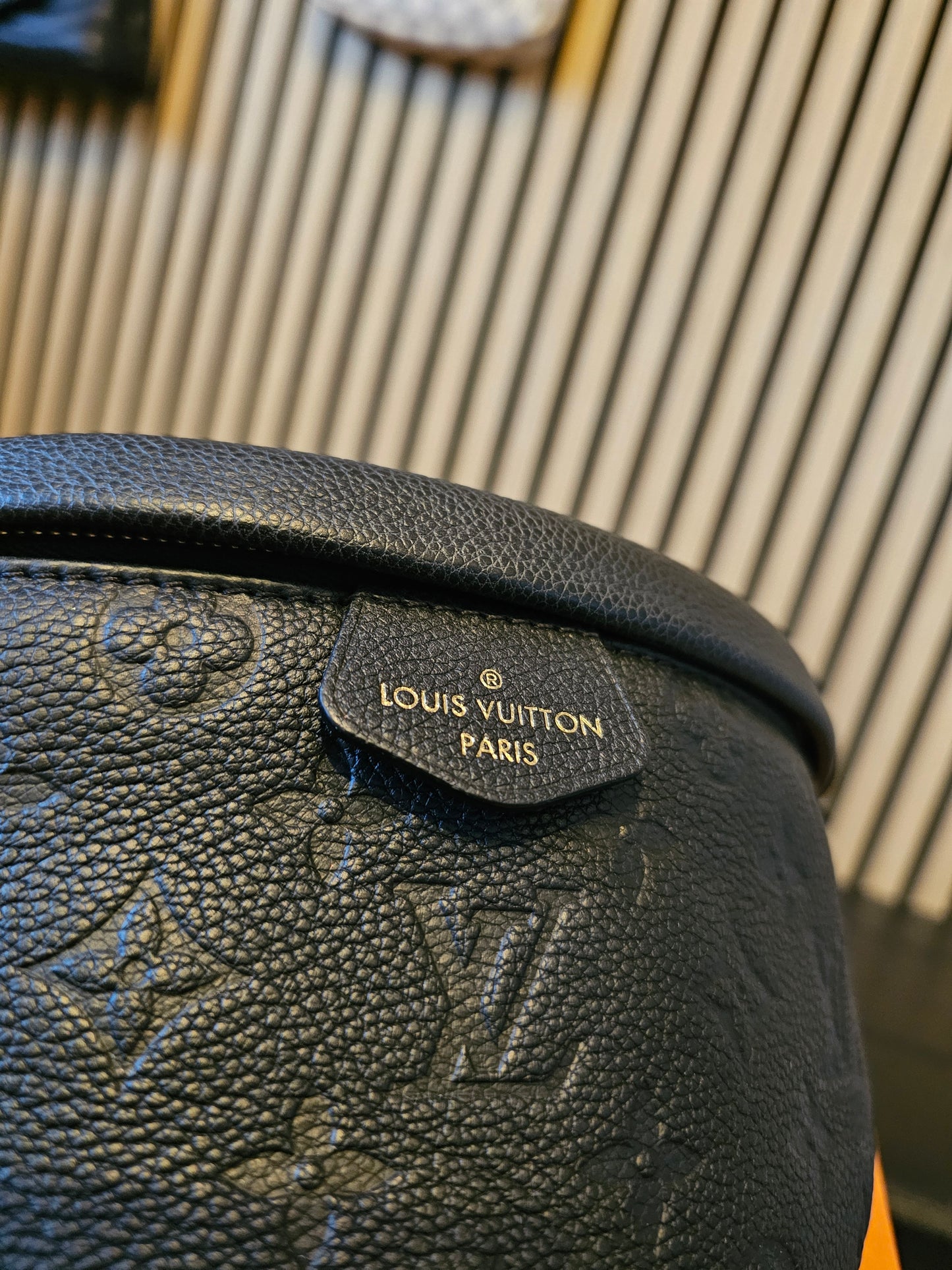 M44812- Louis Vuitton Bumbag in Monogram, black empreinte leather.