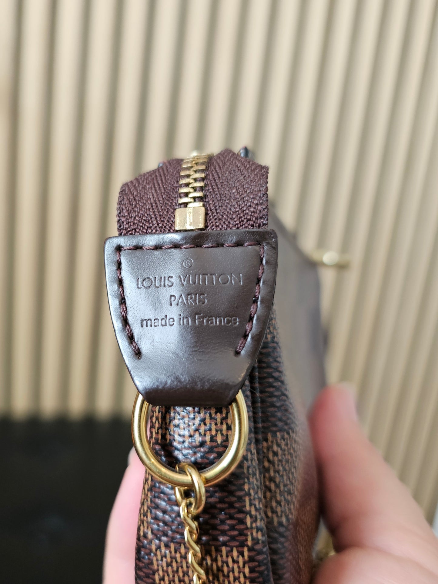 N58009 - Louis Vuitton mini pochette acc. Damier ebene.