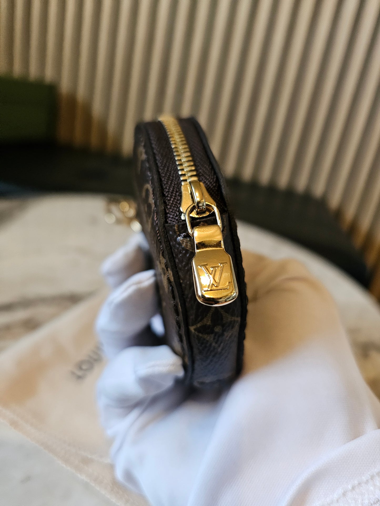 Louis vuitton rund møntpung i monogram kanvas.