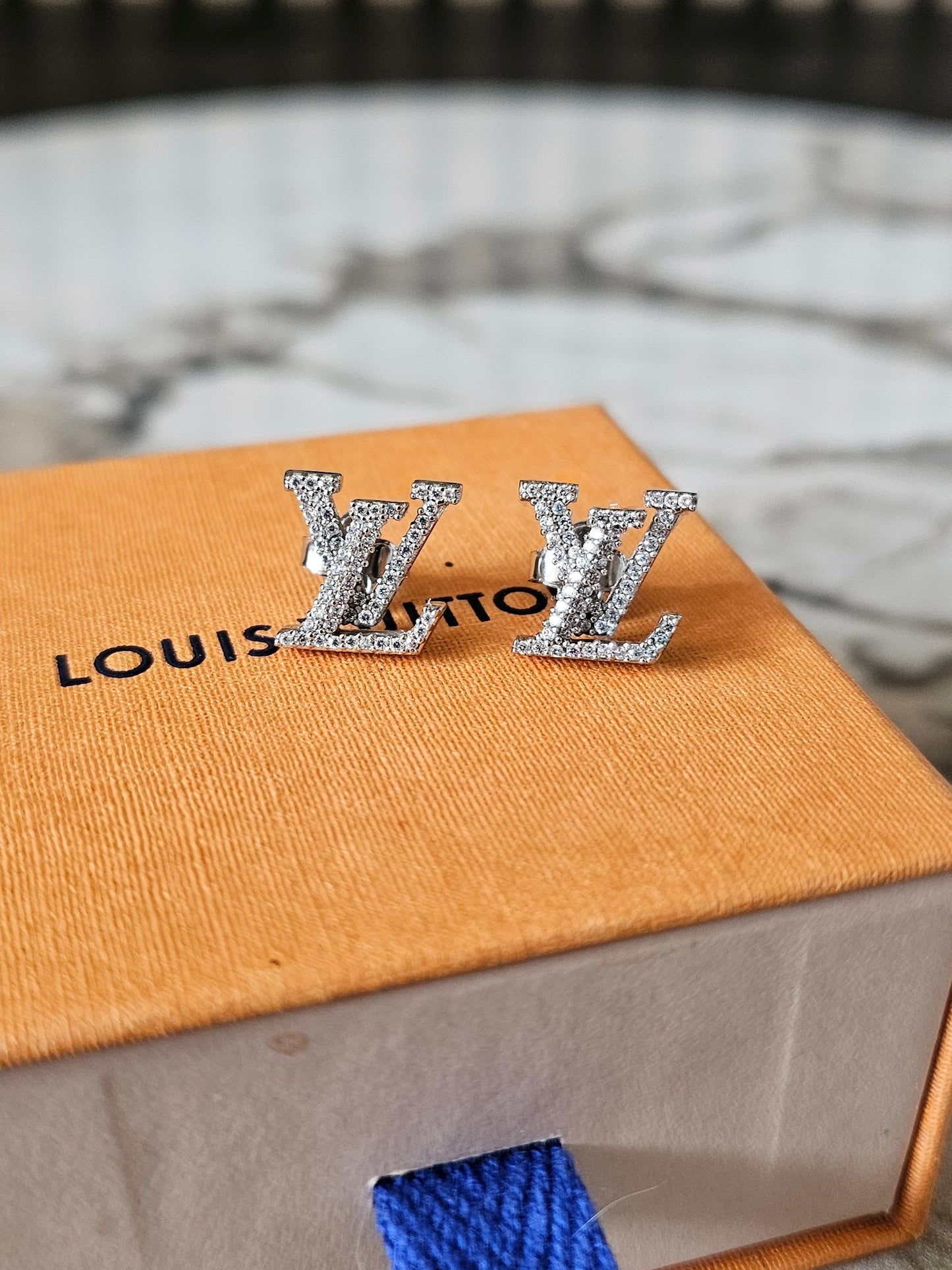 Louis Vuitton iconic LV earrings, silver/palladium with stones.