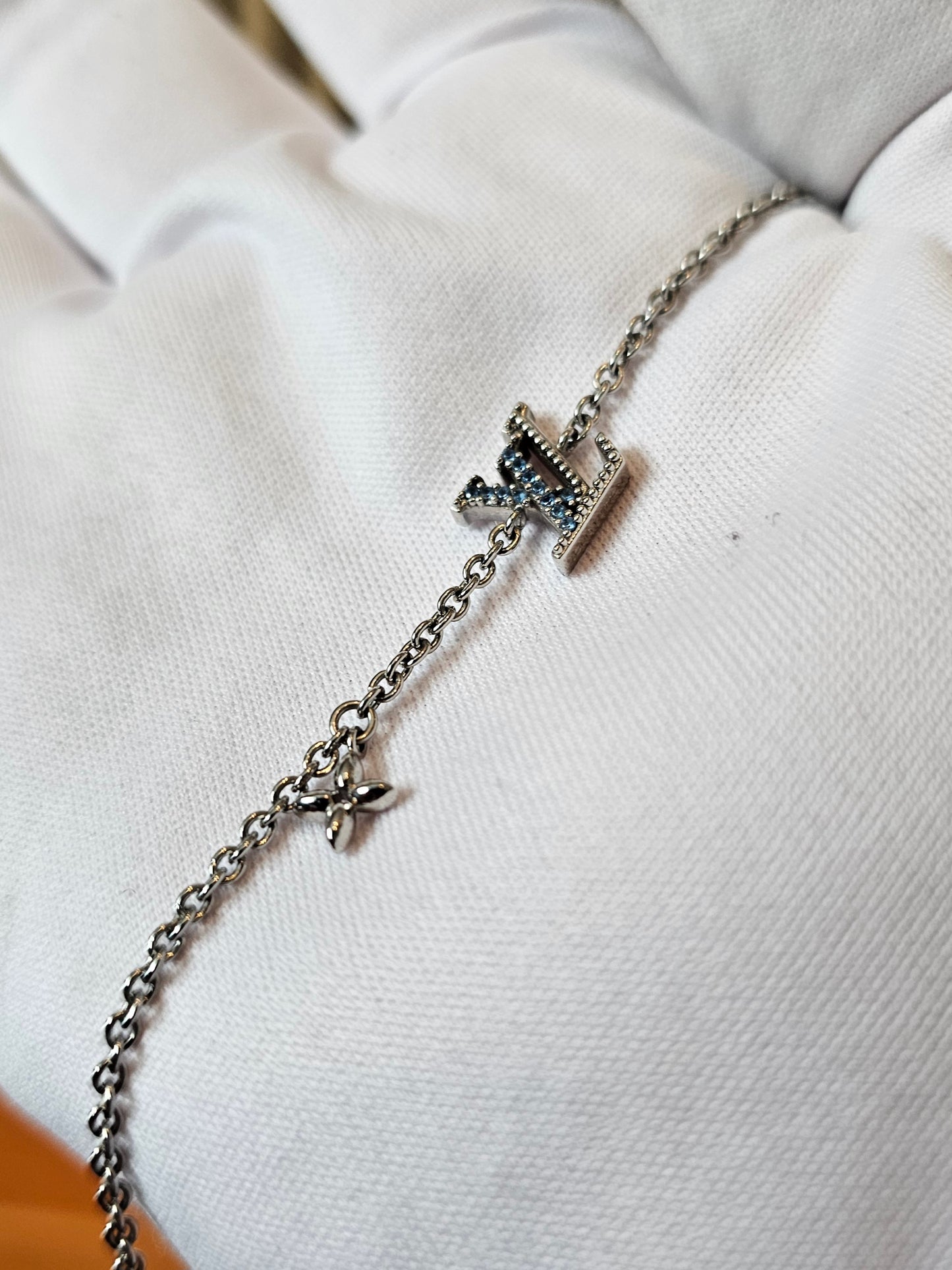 M0941A - Louis Vuitton, LV iconic bracelet, silver with blue stones.
