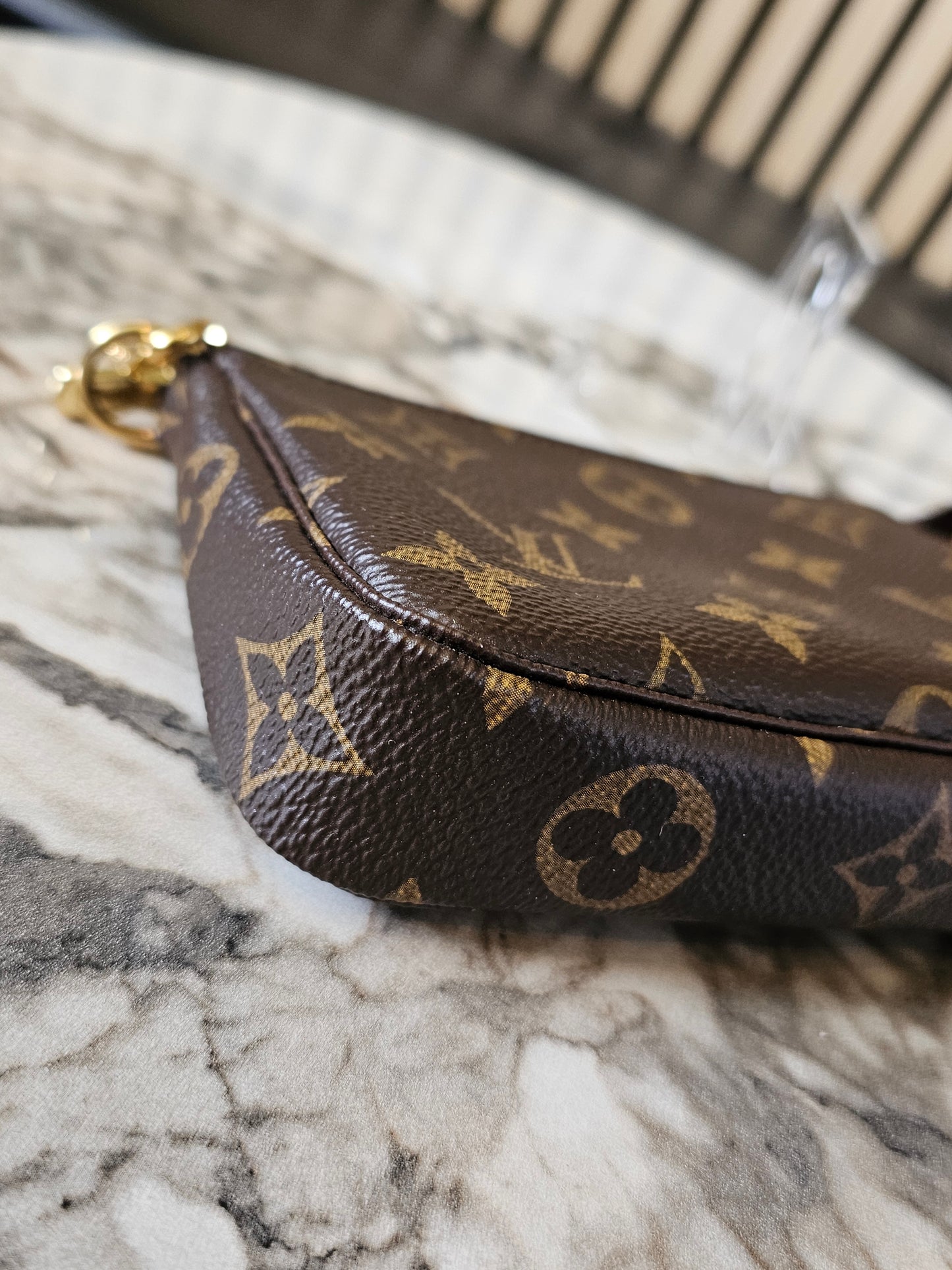 M58009 - Mini pochette accesories Mng. Kanvas.