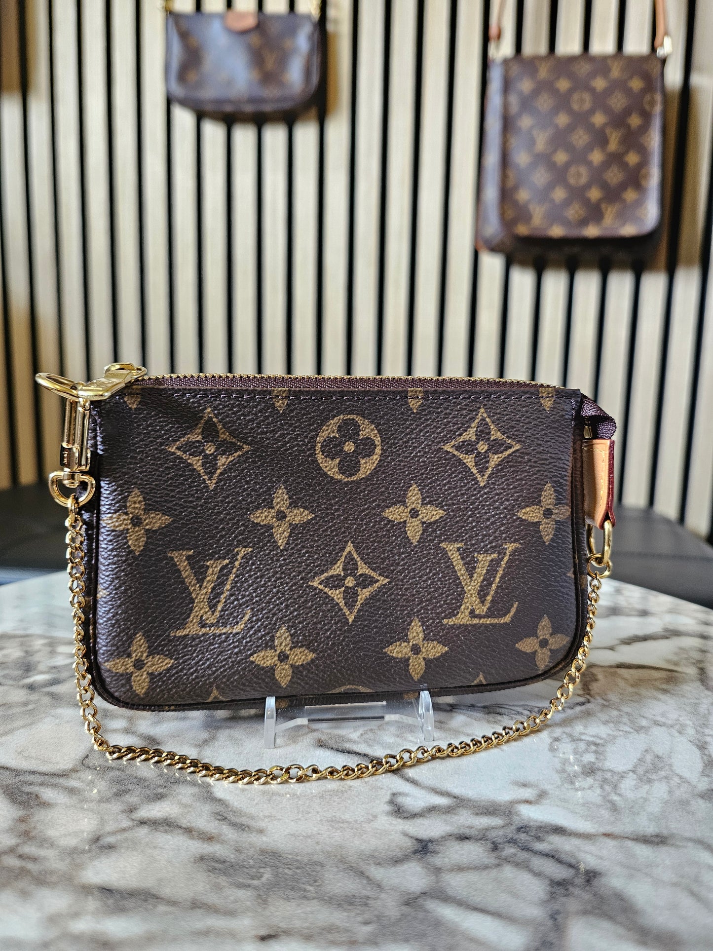 M58009 - Mini pochette accesories Mng. Kanvas.