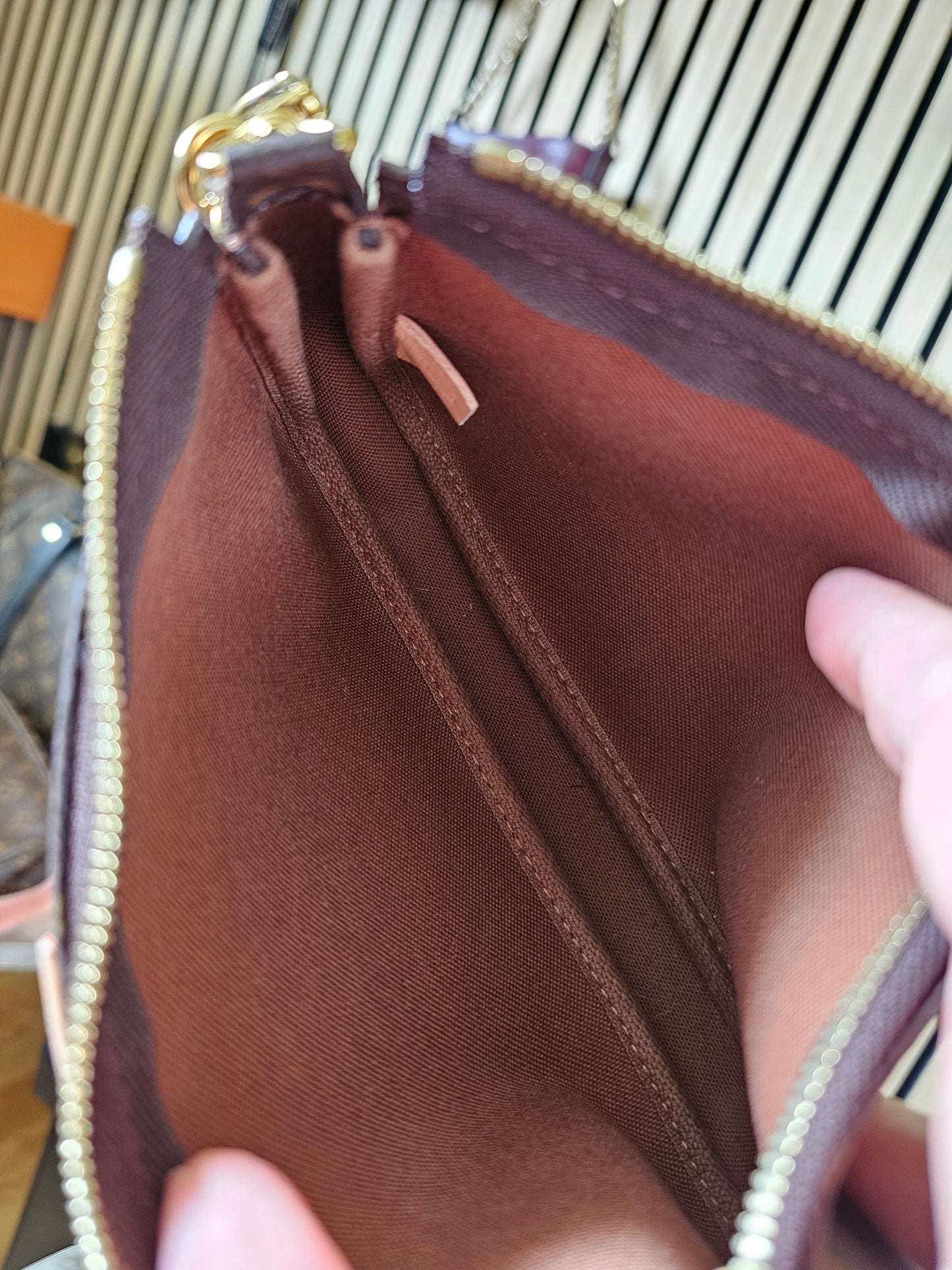 Louis Vuitton pochette with chain, monogram kanvas.