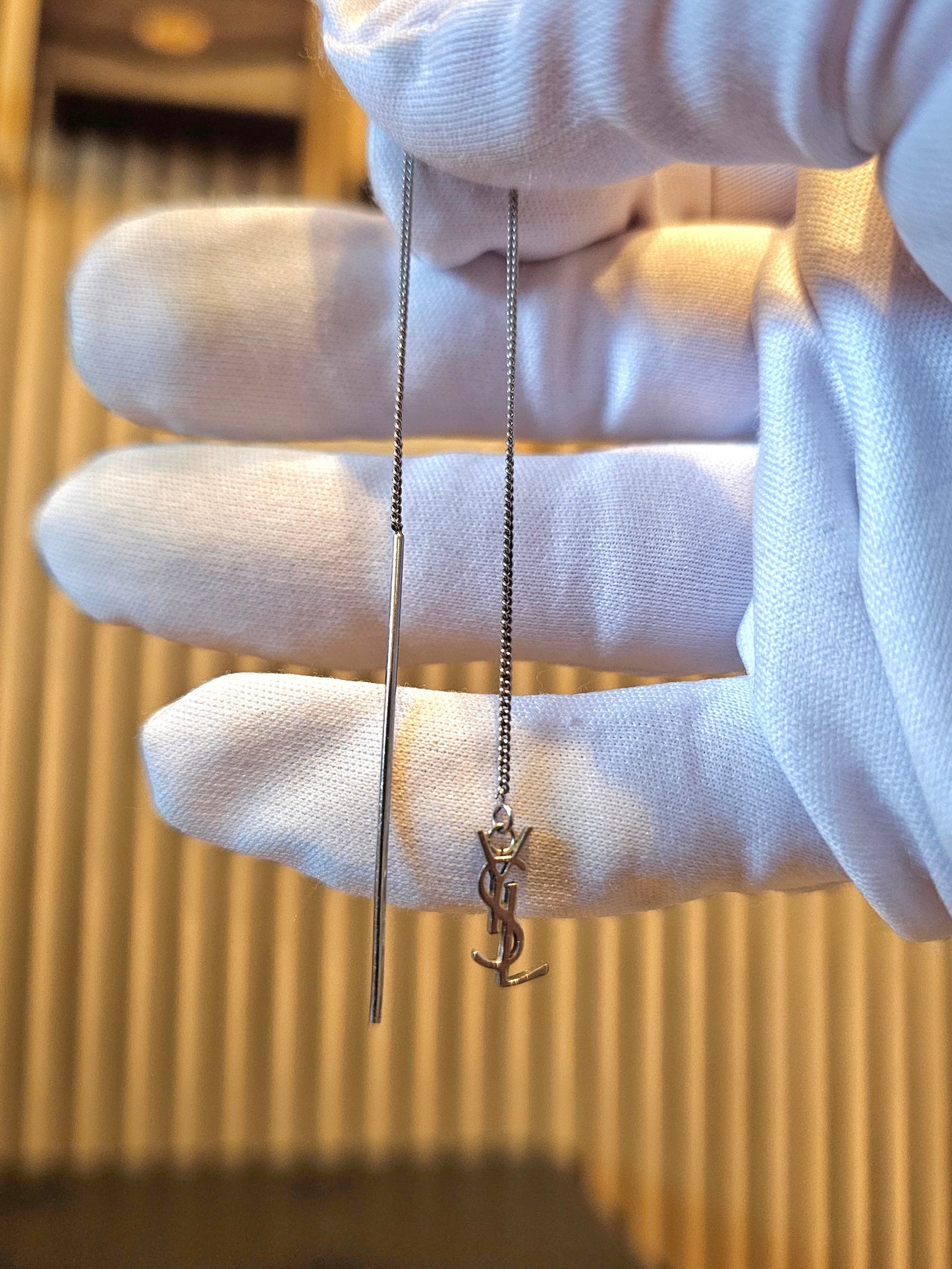 YSL Cassandre long earrings in silver.