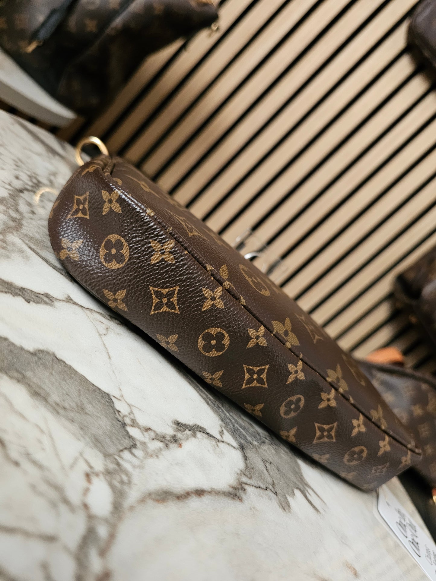 Louis Vuitton pochette accesories, monogram kanvas.