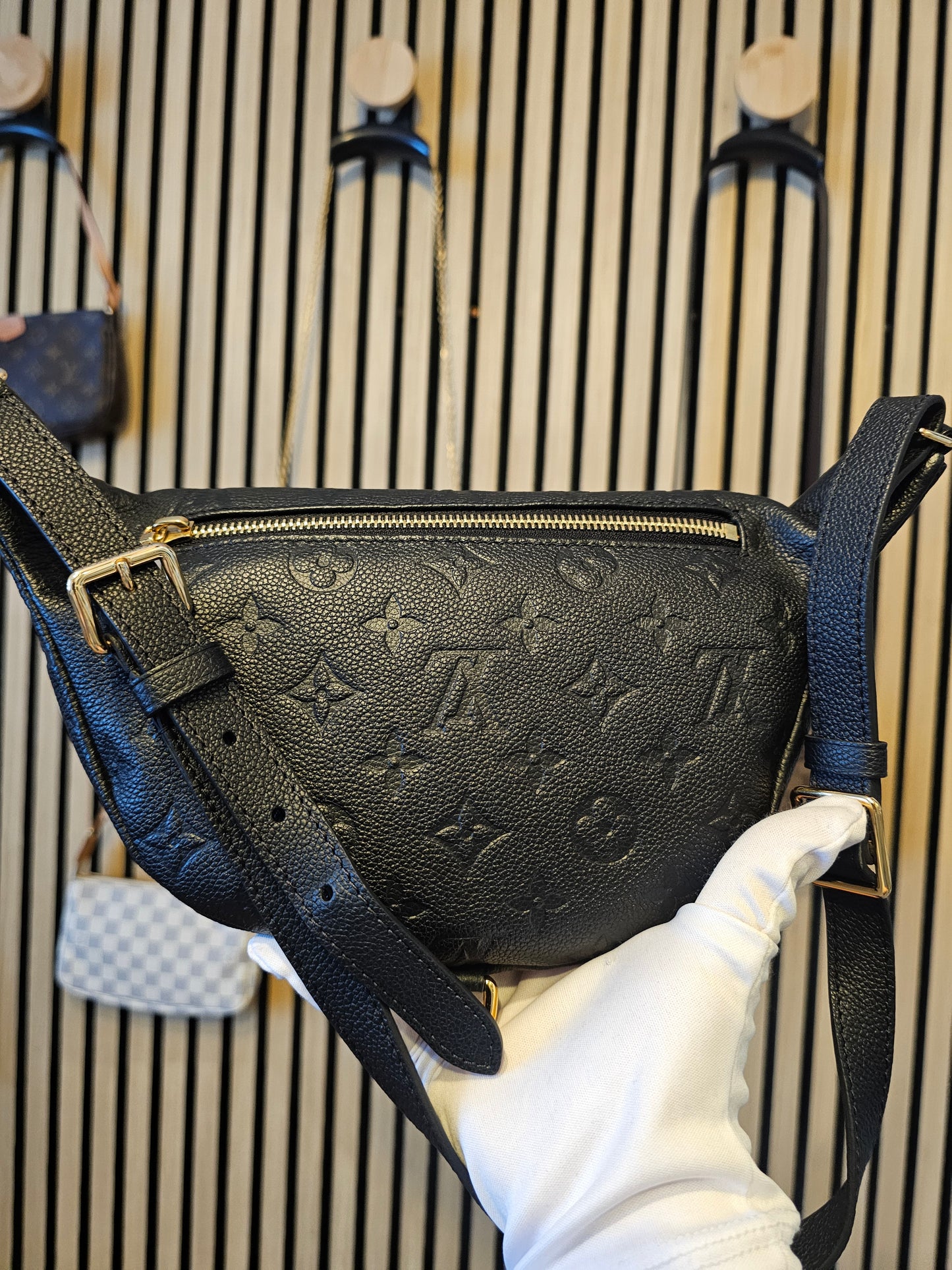 M44812- Louis Vuitton Bumbag in Monogram, black empreinte leather.