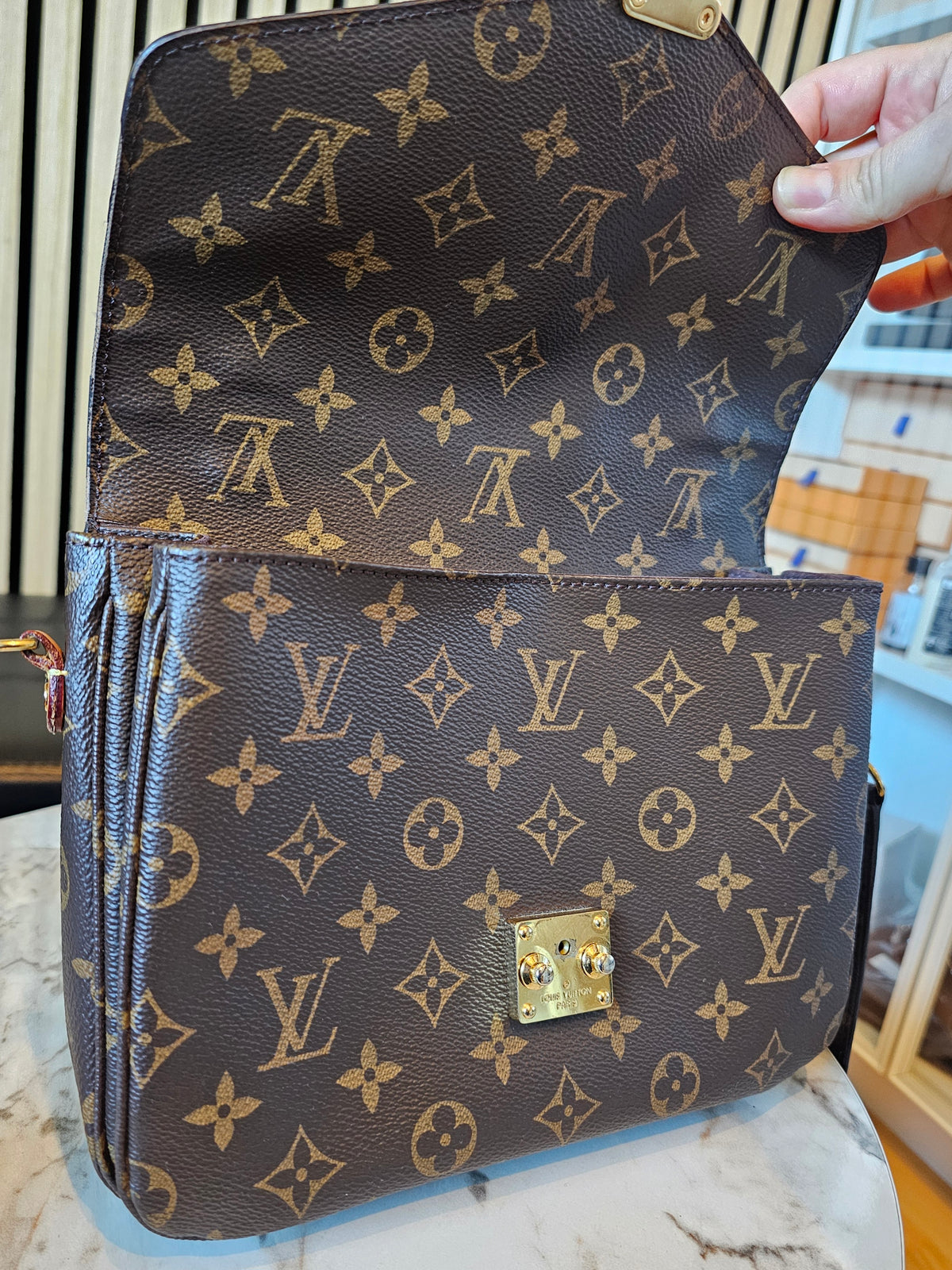 M44875 - Louis Vuitton bag, pochette Métis, monogram kanvas.