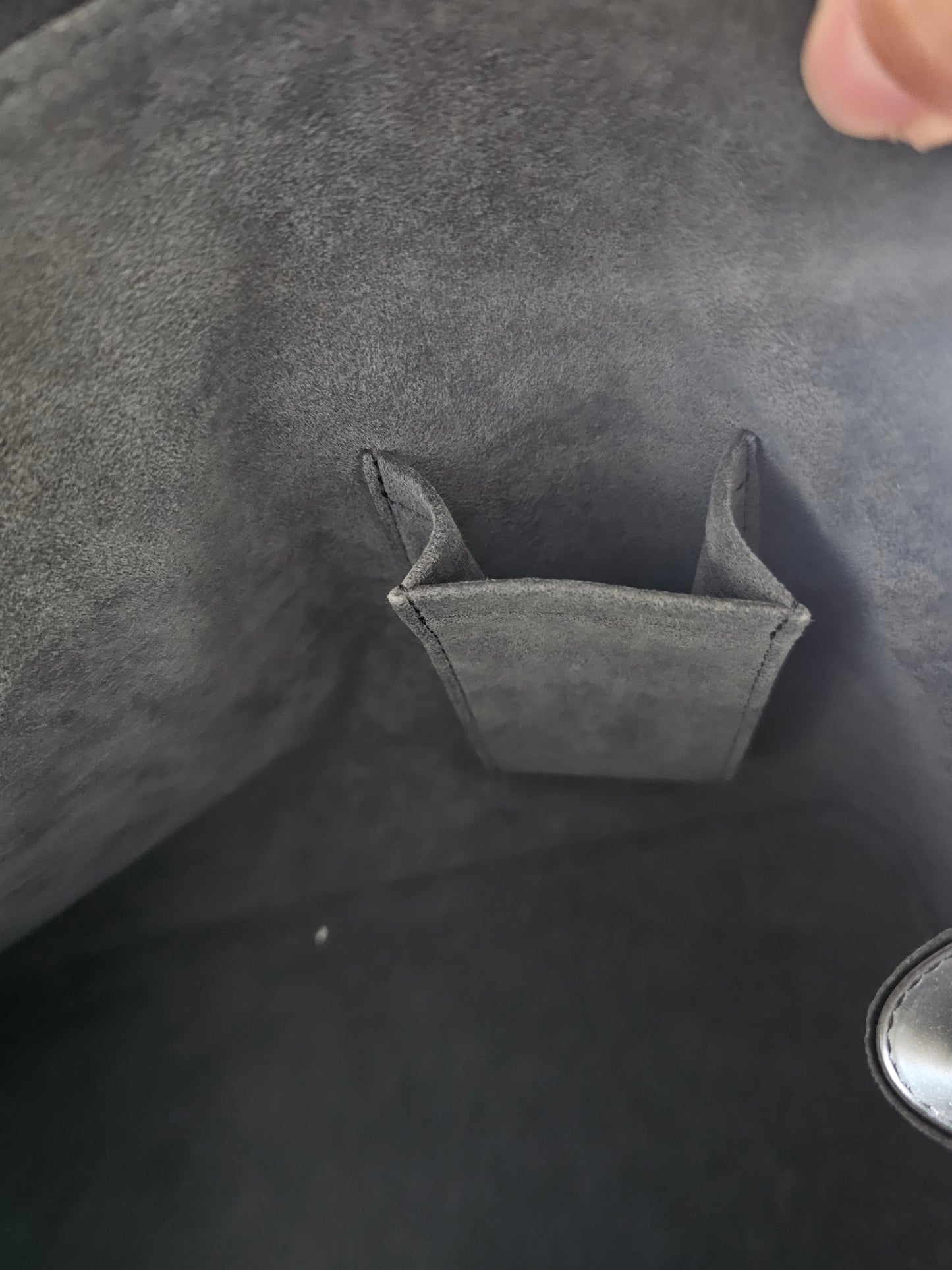 Louis Vuitton Alma PM with adjustable shoulder strap.