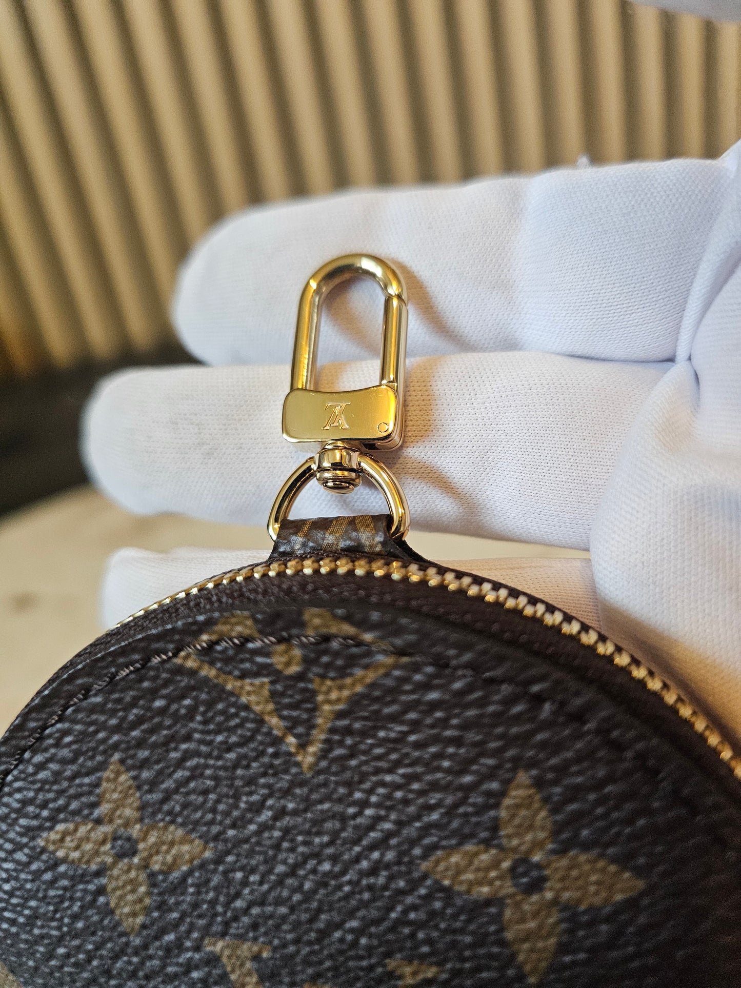 Louis vuitton rund møntpung i monogram kanvas.